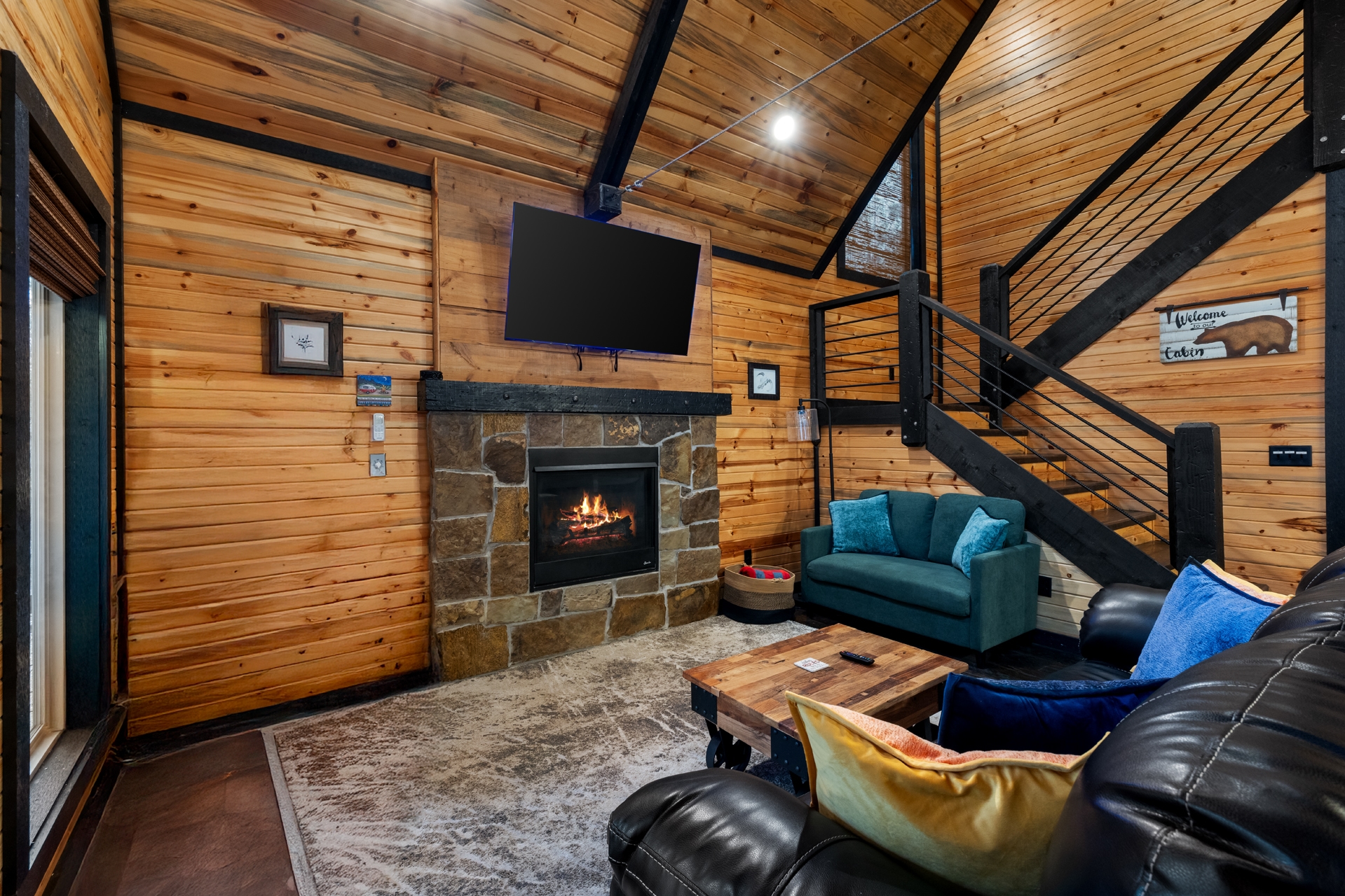 open living room with tv and 2 couches