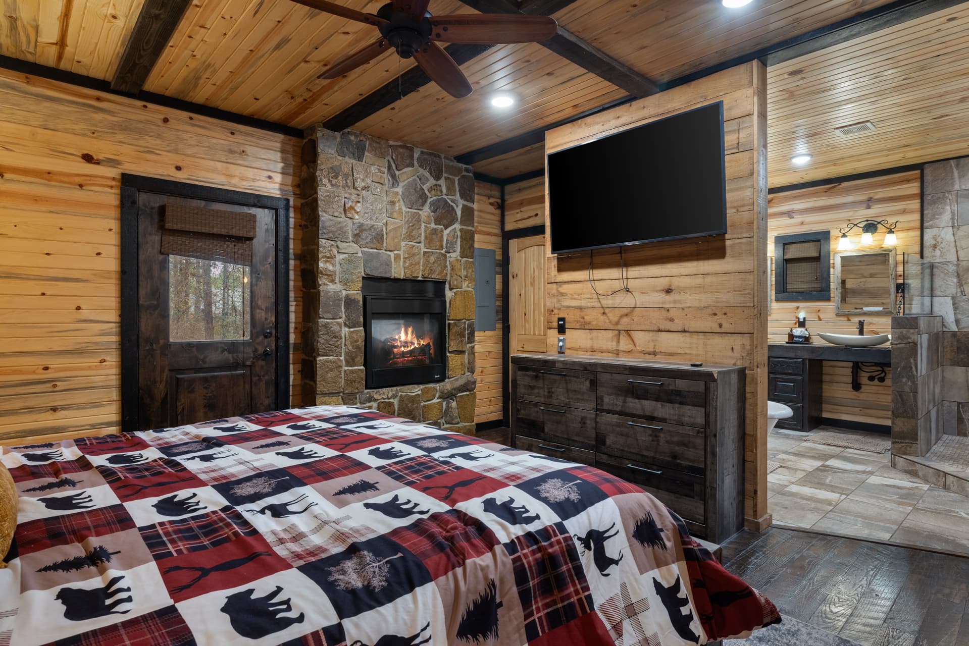 king bed, tv, and dresser