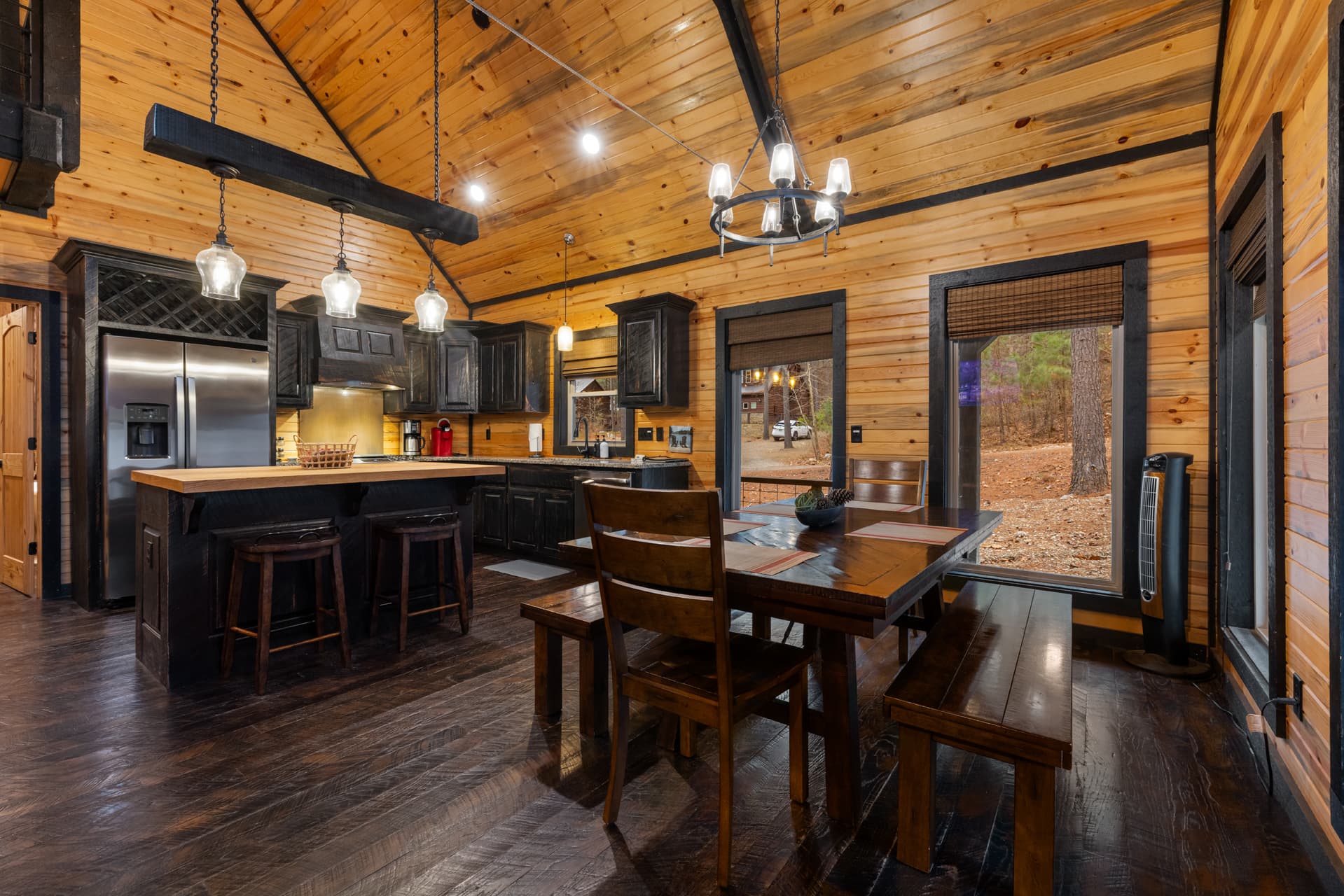 Open living room with stairs leading up to loft