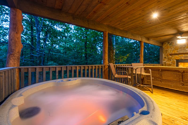 hot tub on covered back porch