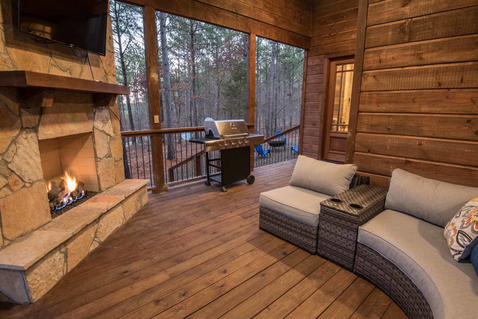 Outside covered porch fireplace with seating