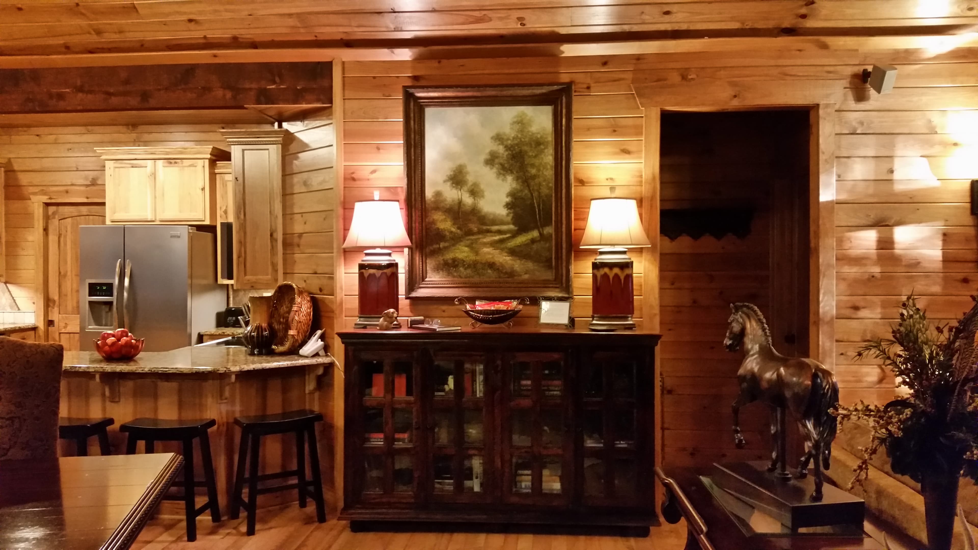 Dresser and art by living room