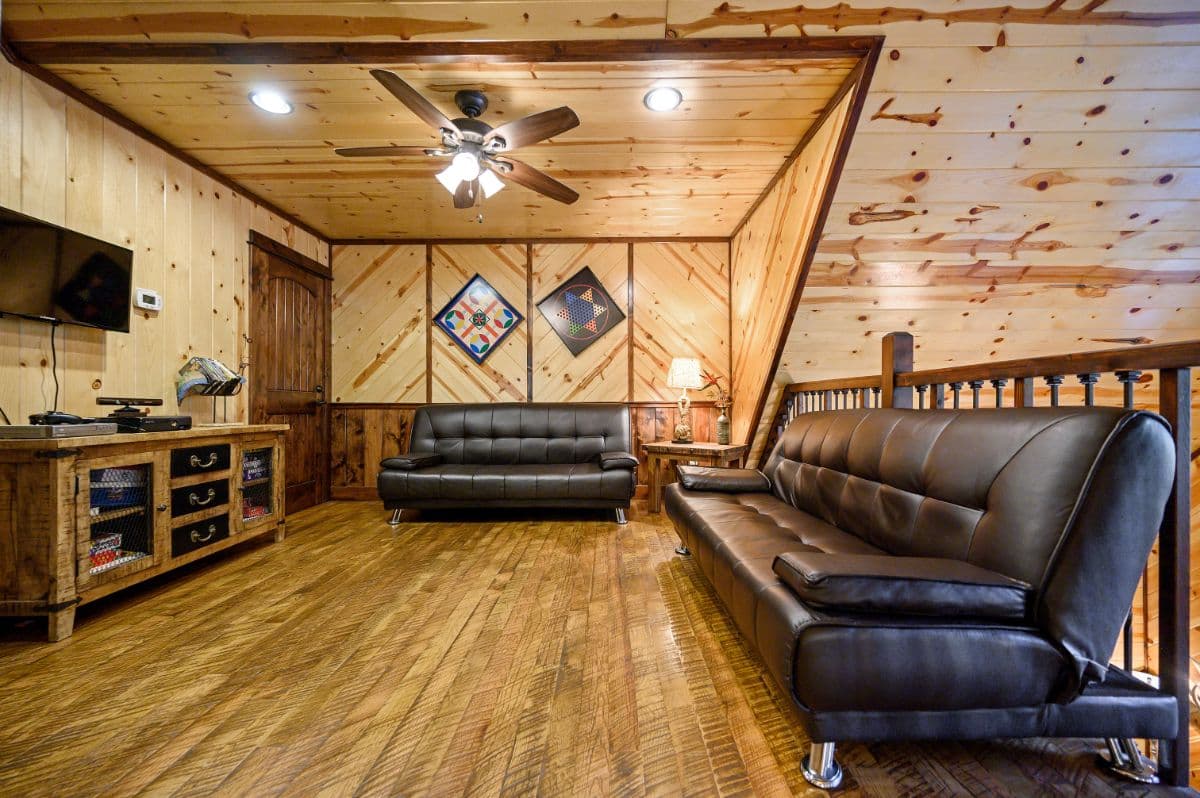 Upstairs loft with 2 futons, TV, and games