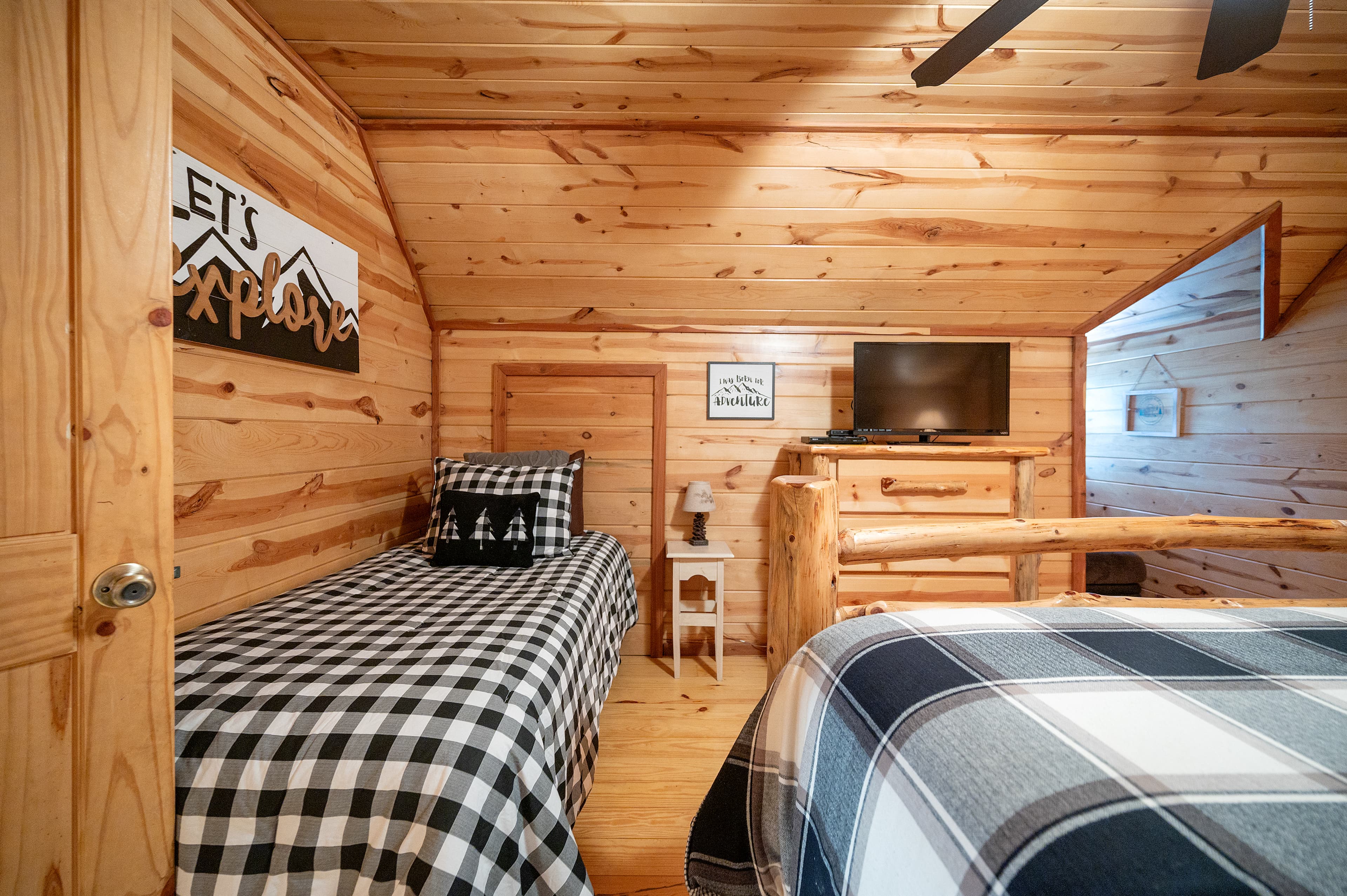 Different angle of upstairs bedroom, king bed, twin bed, TV