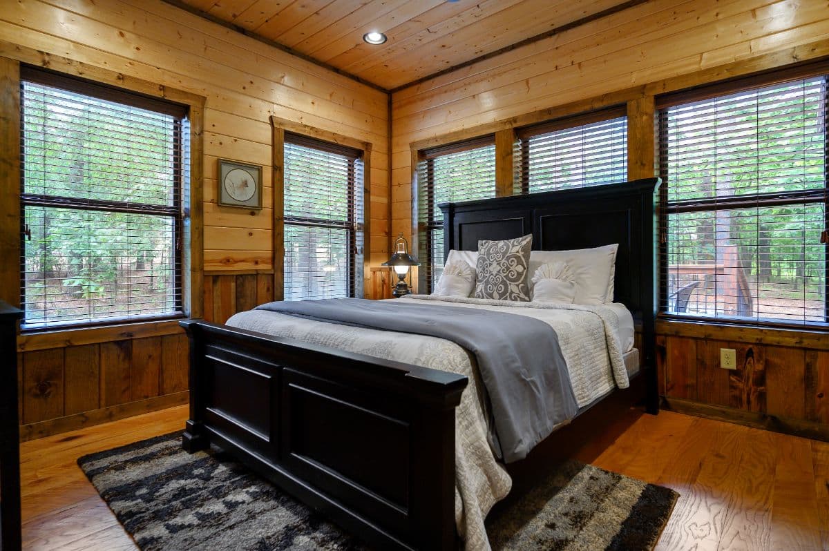 bedroom with side table and dresser