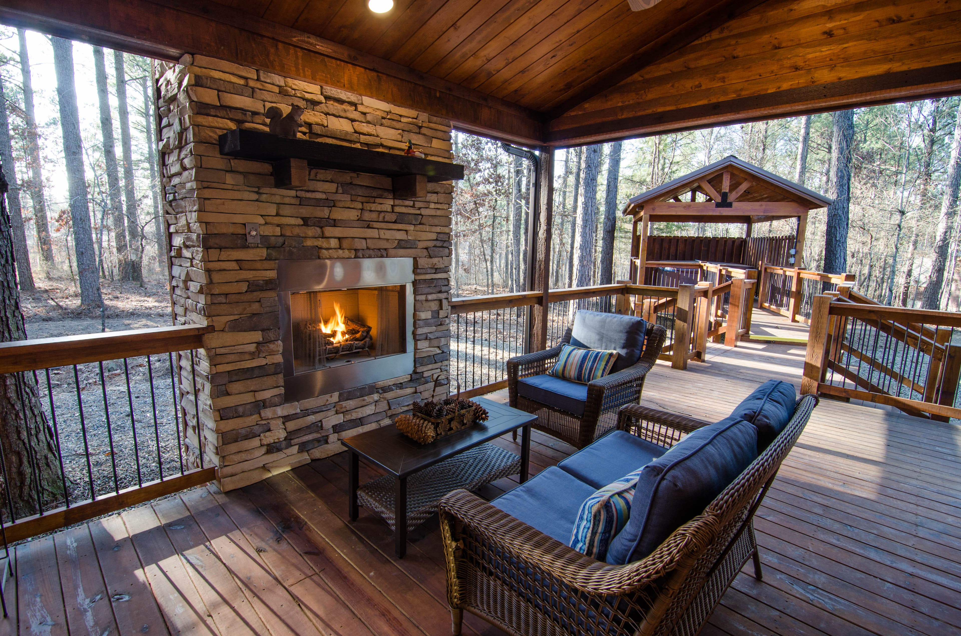 Covered back porch with gas log fireplace