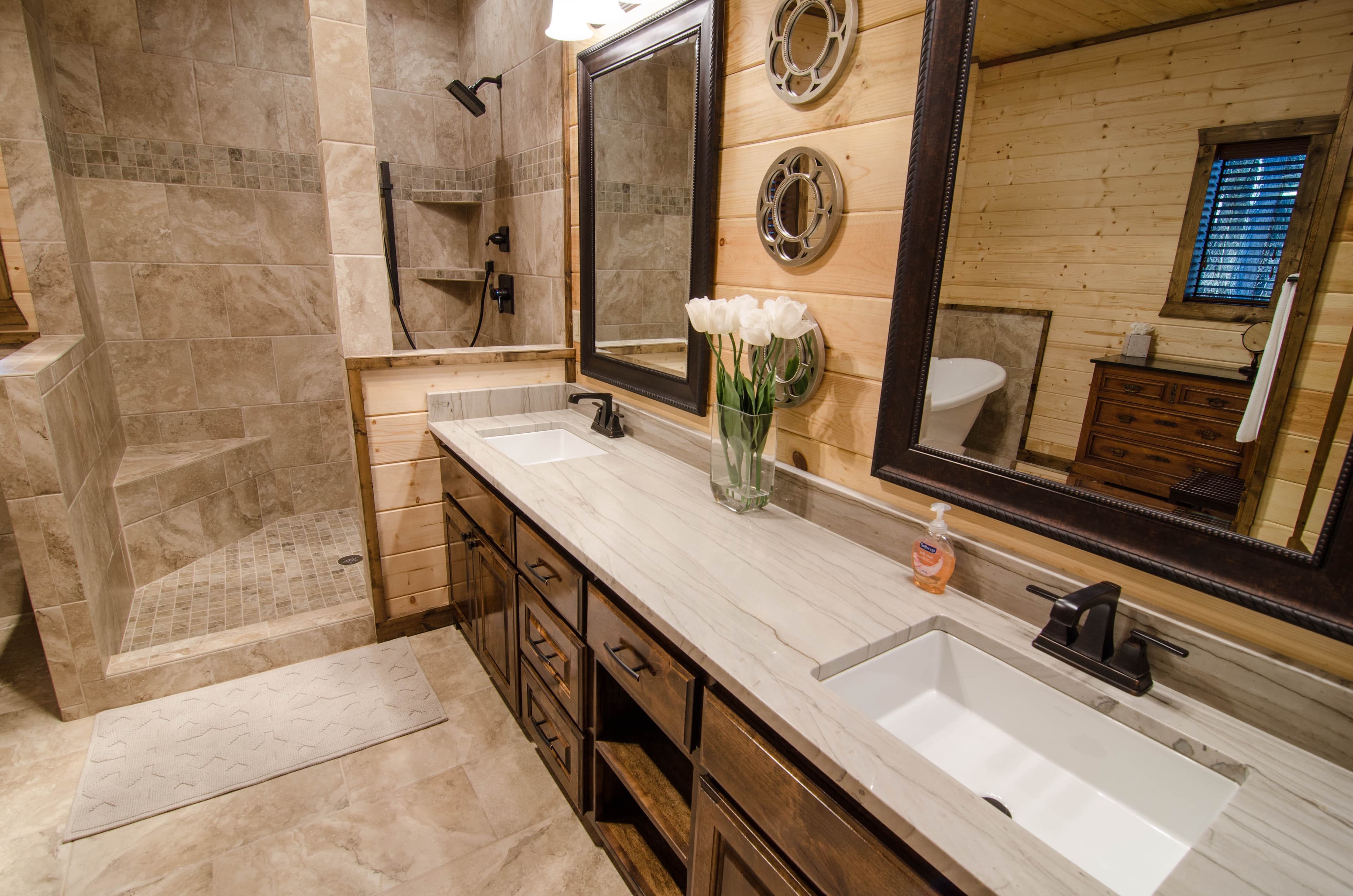 sinks and walk in tile shower