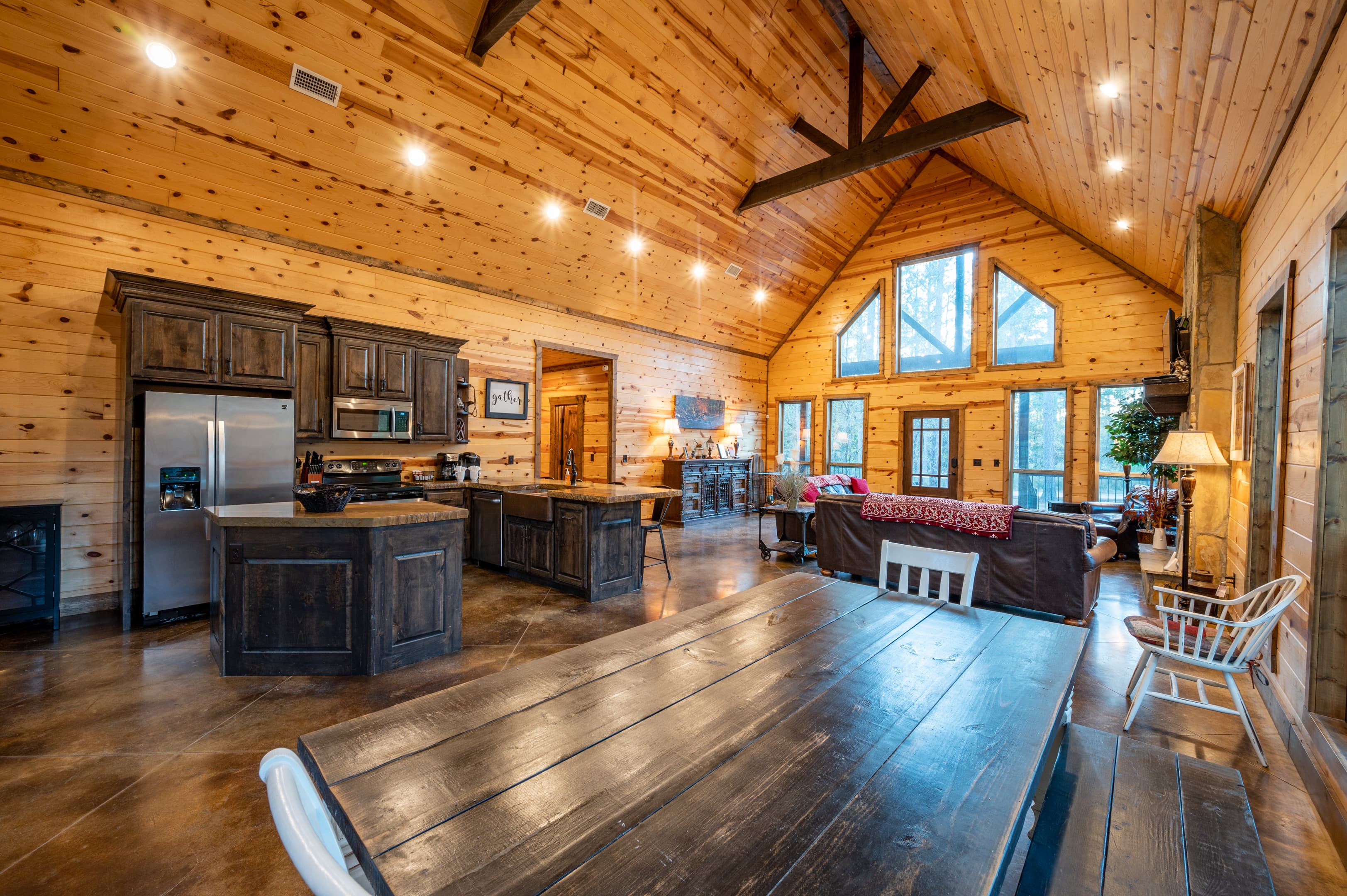 Dining table in open dining room beside kitchen
