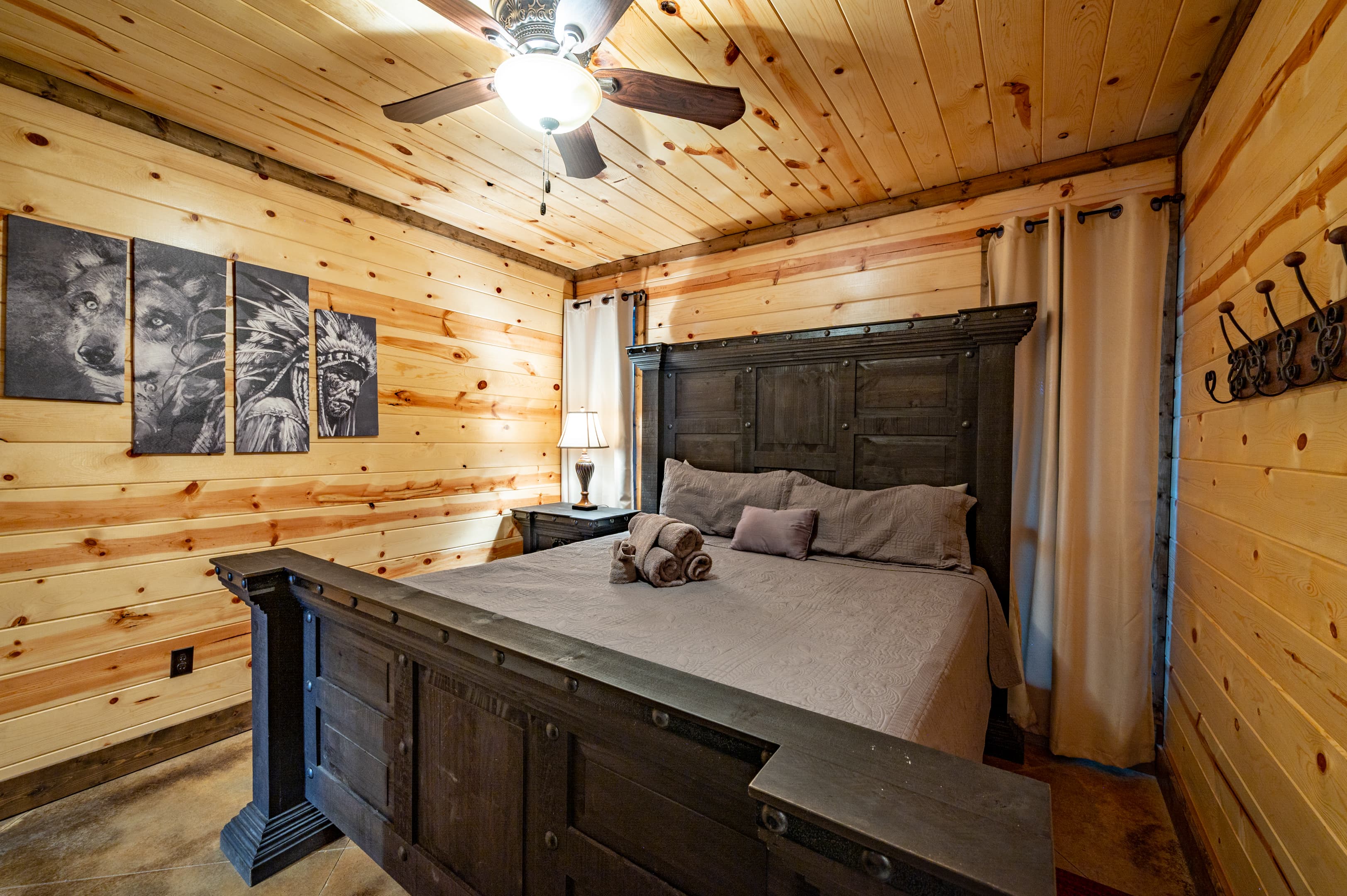 King bedroom, wolf art on wall