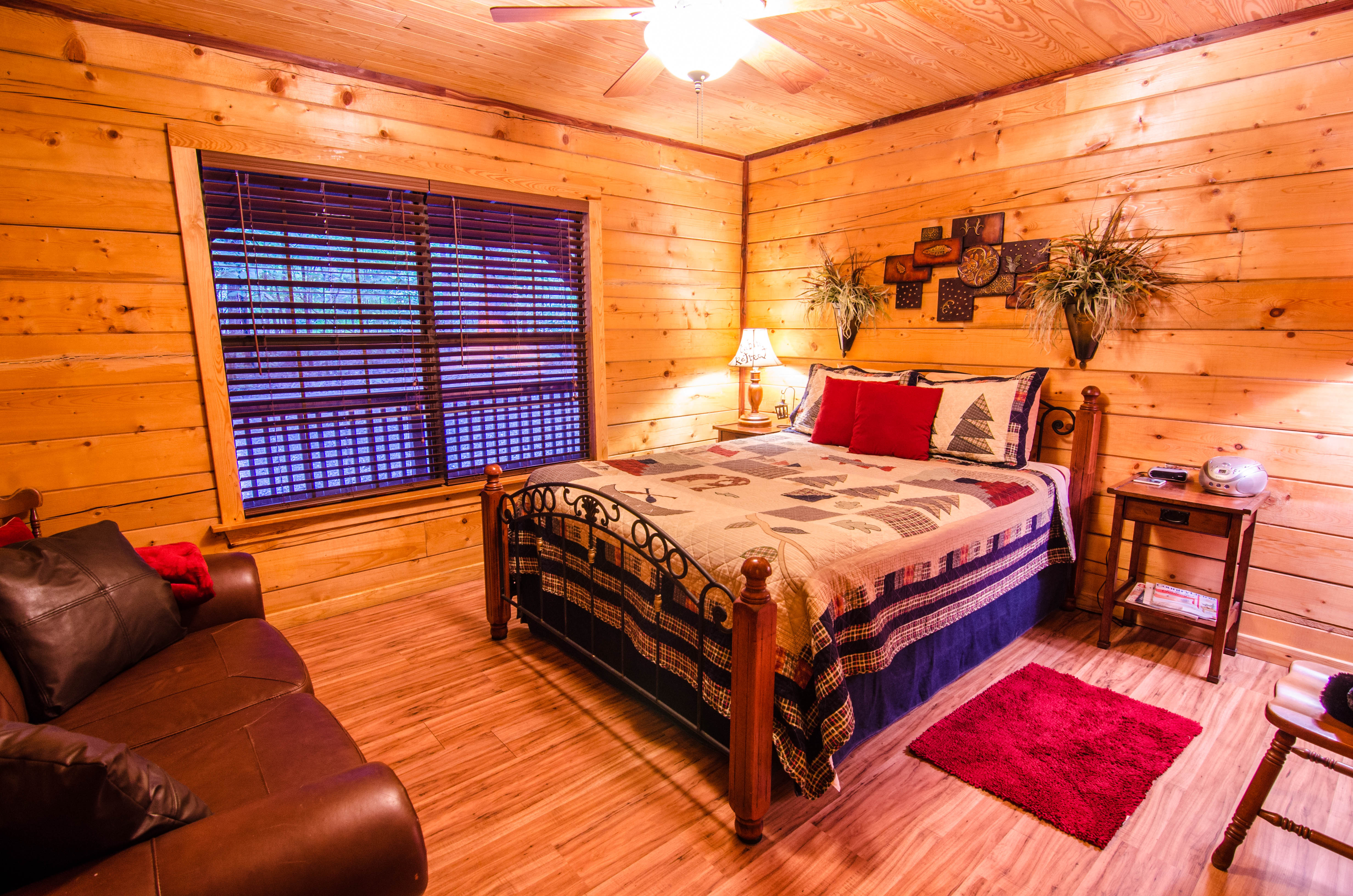 King front bedroom with chair and couch