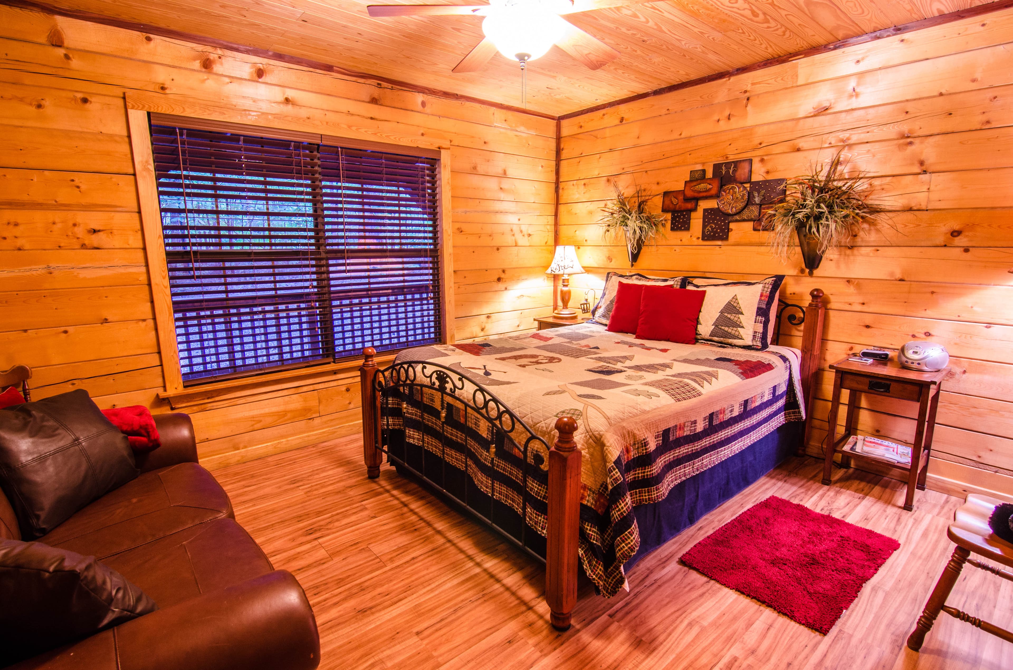King front bedroom with chair and couch