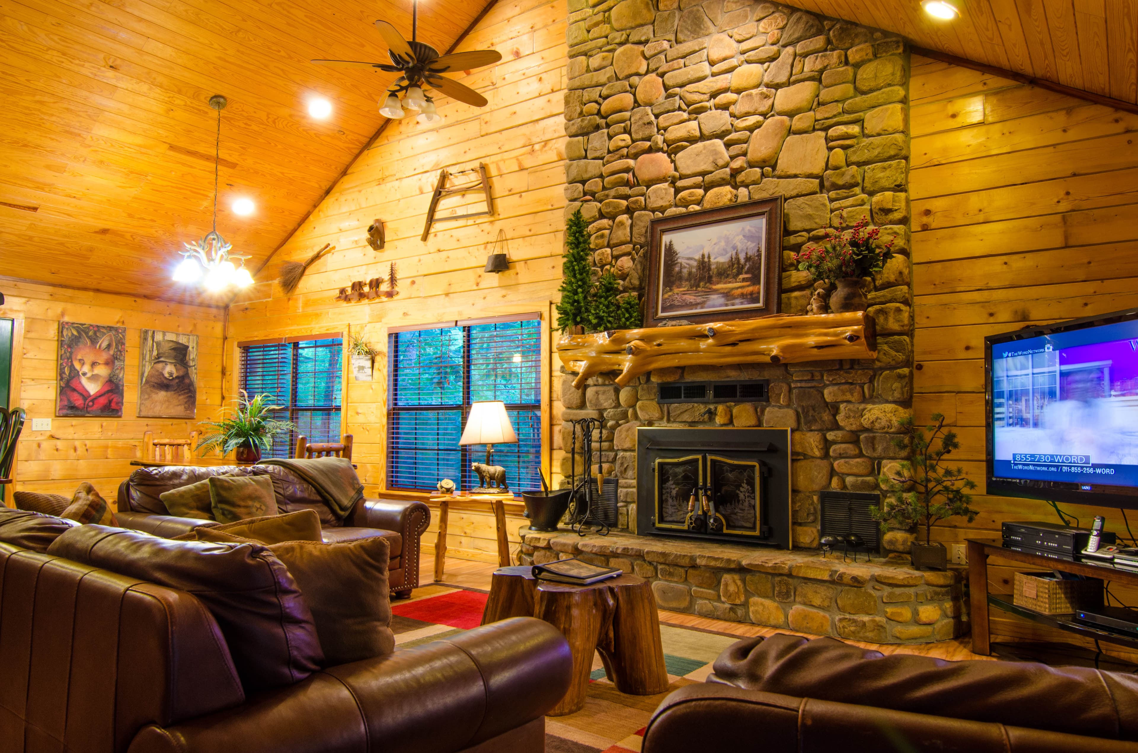 Living room area with rock fireplace