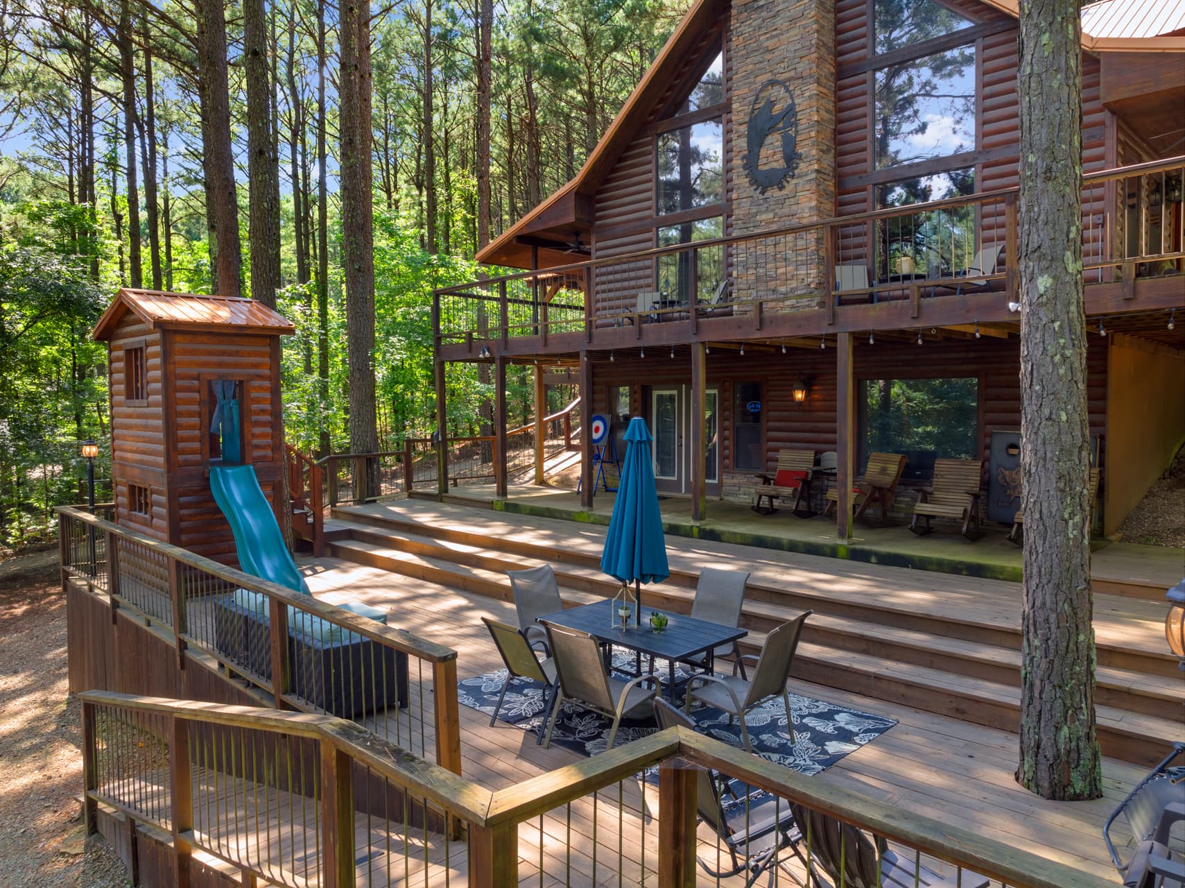 Front deck playground, table, and axe throwing game