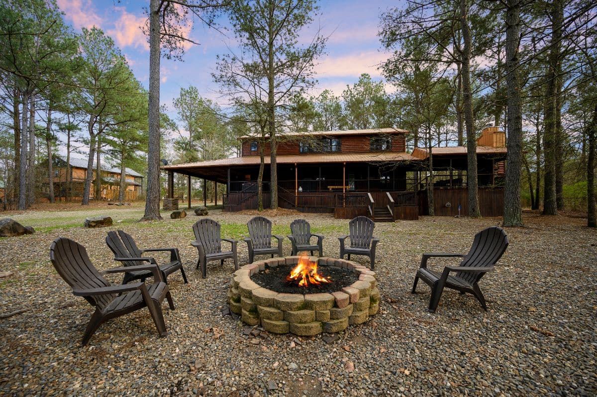 fire pit in backyard with chairs