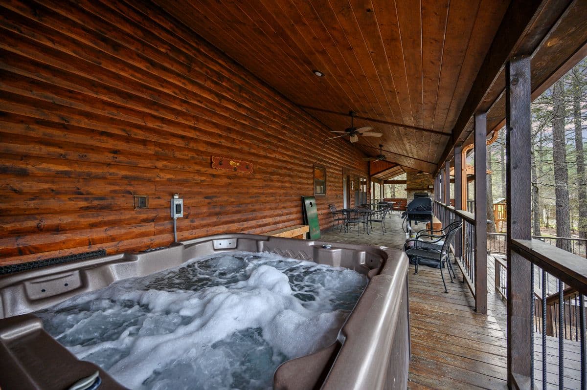 hot tub on covered wooden deck