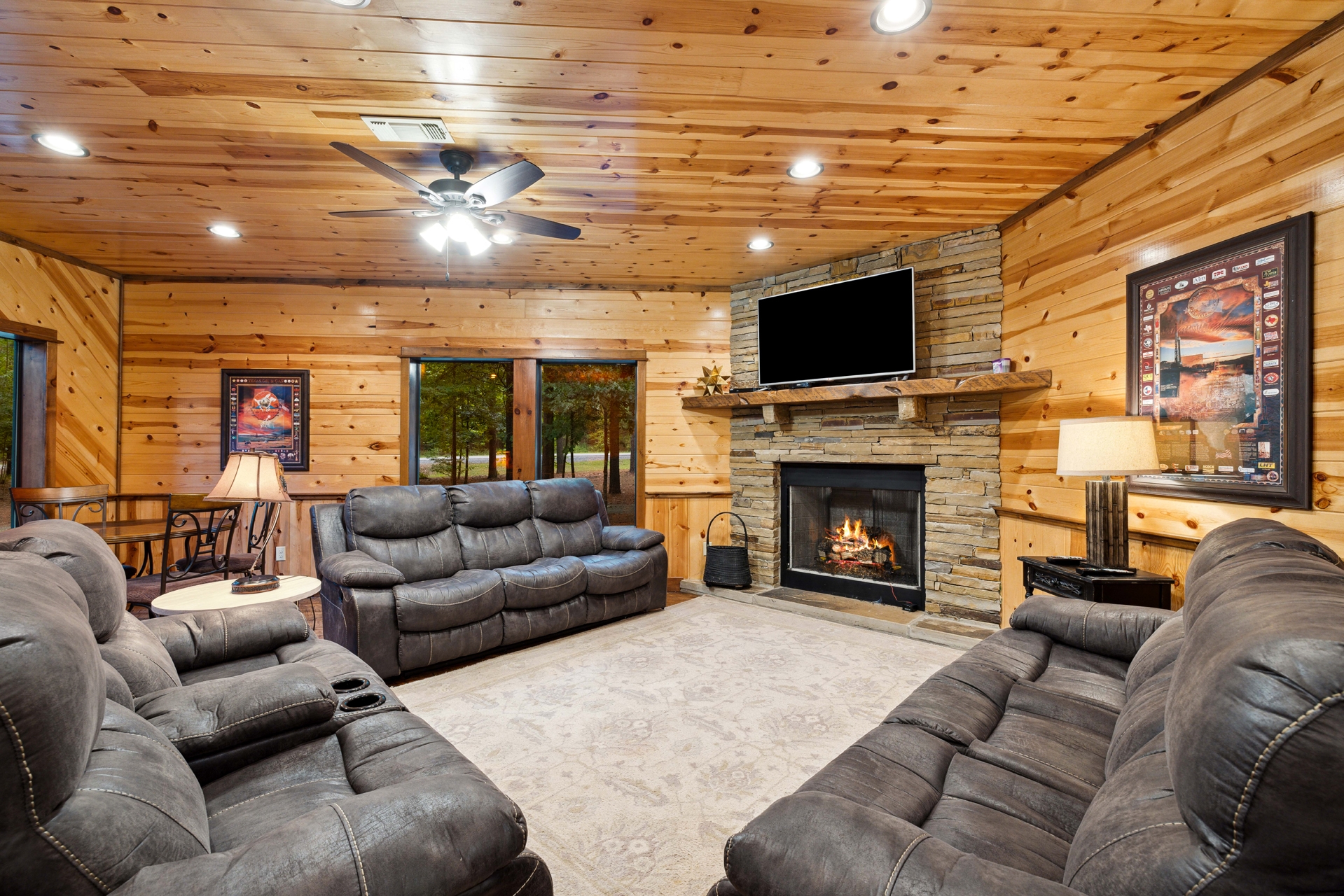 2nd living room with fireplace and tv, 3 couches