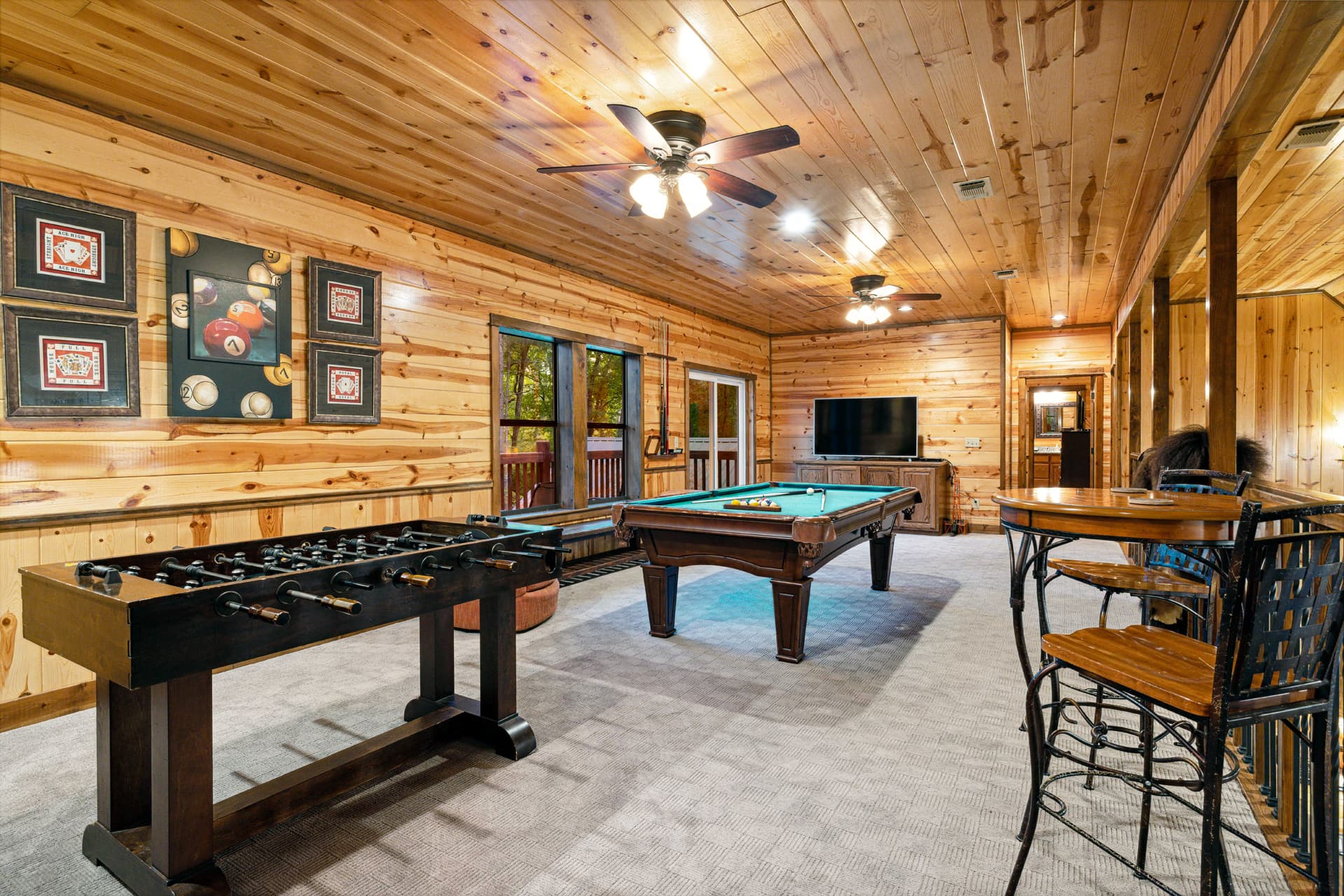 pool table and foosball in open loft