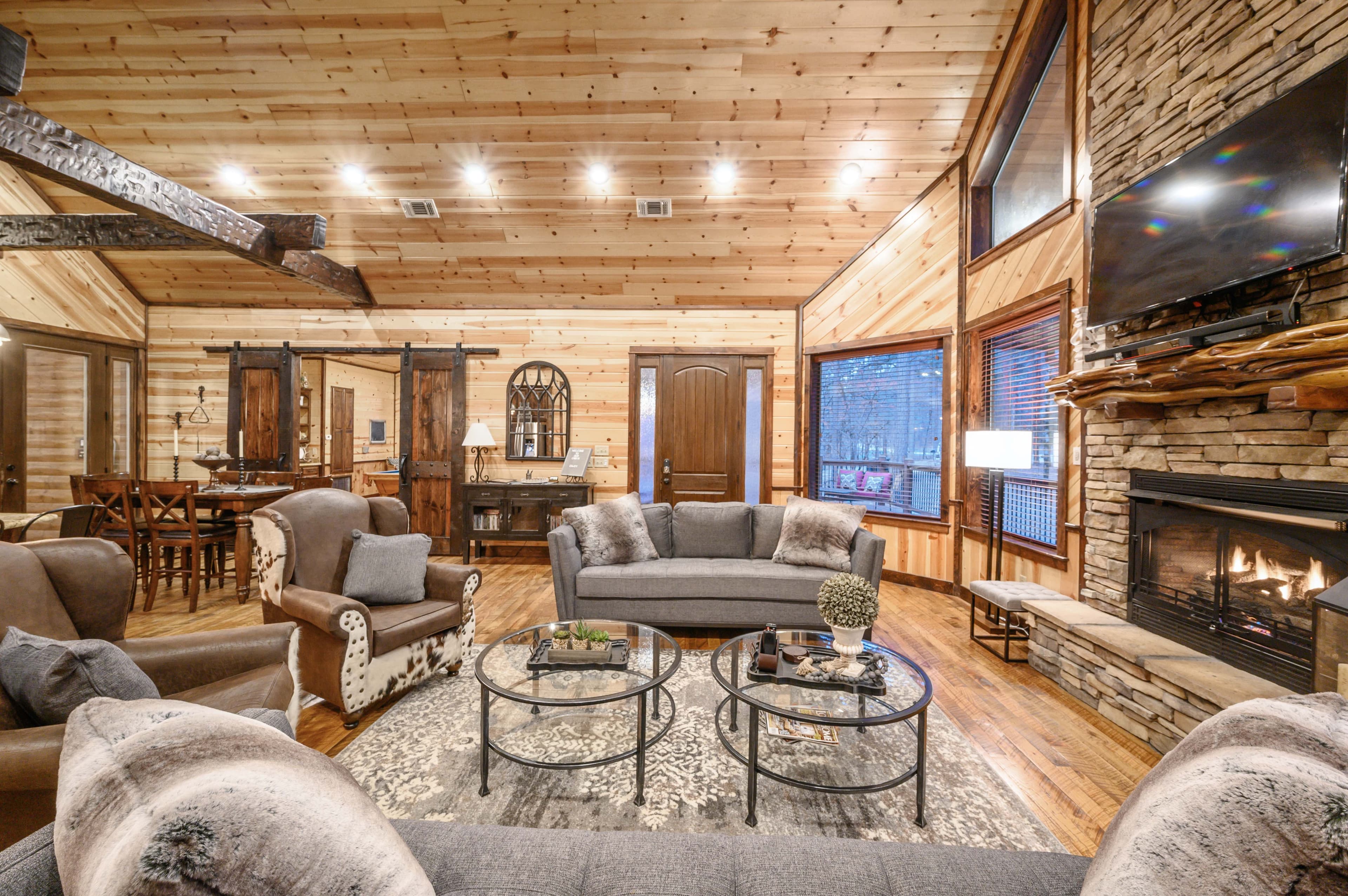 open living room with tv and fireplace