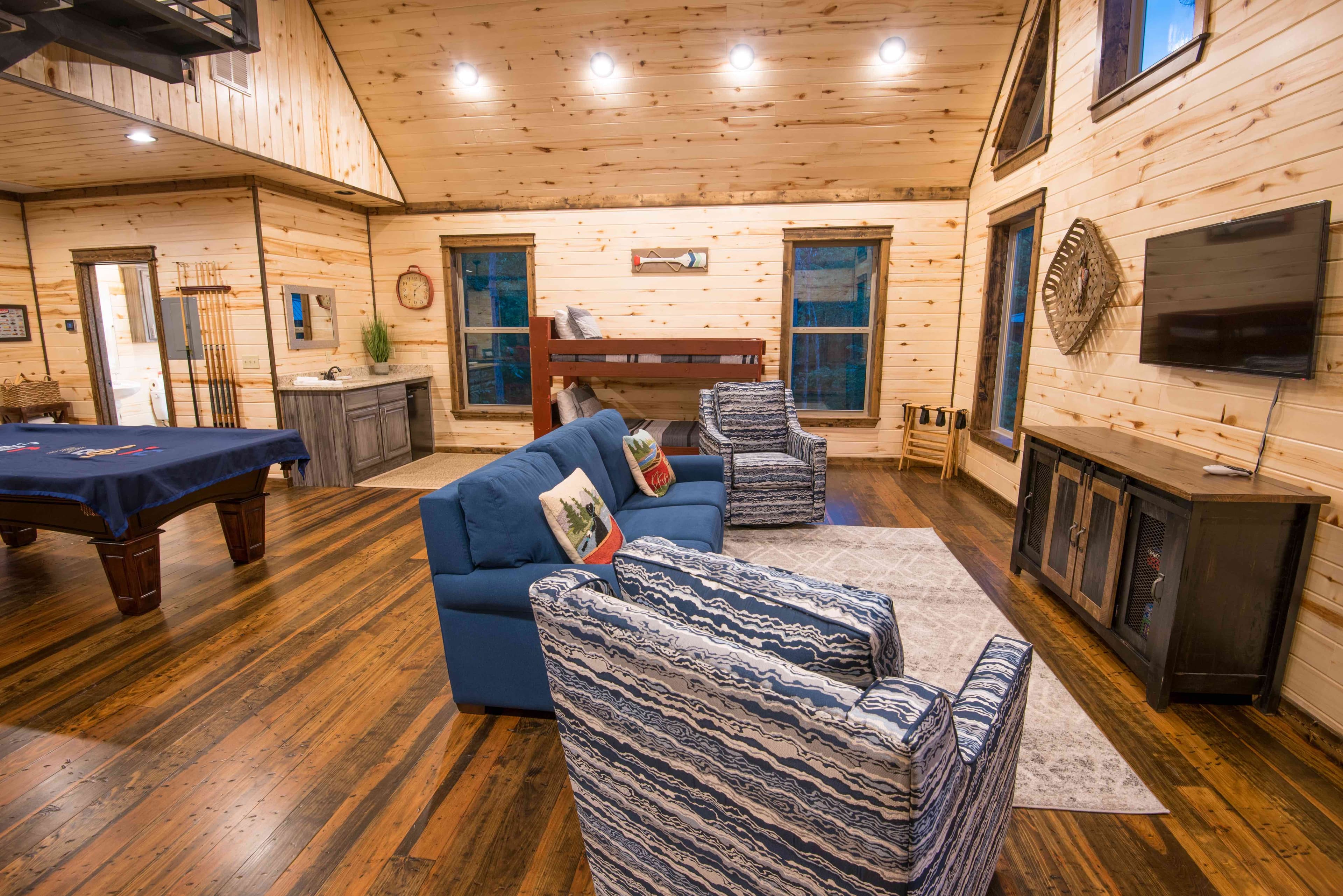 Separate building game room and living room, bunk bed set downstairs