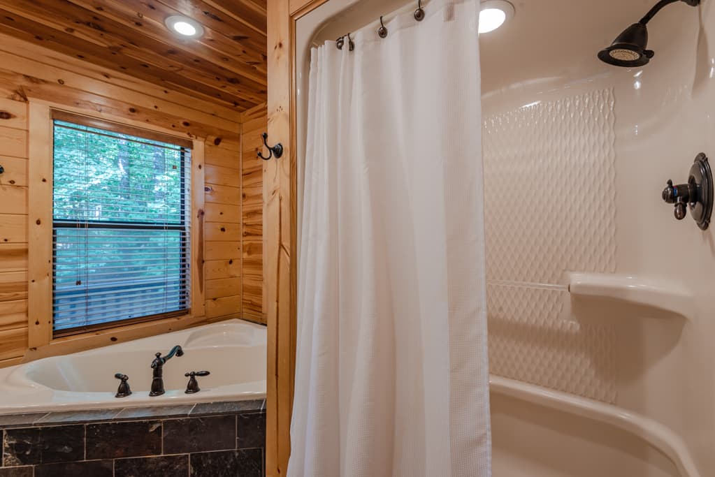 Upstairs Game Room with pool table and foosball, located above garage