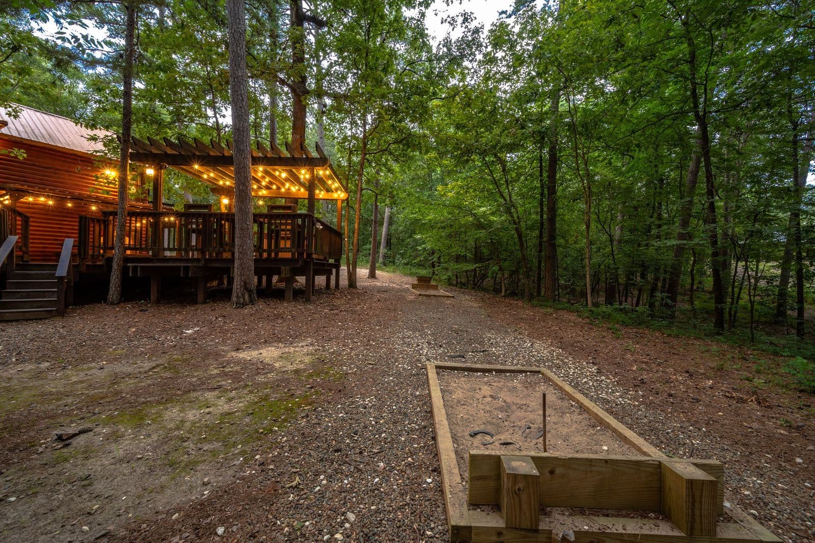 Horseshoe game in gravel backyard