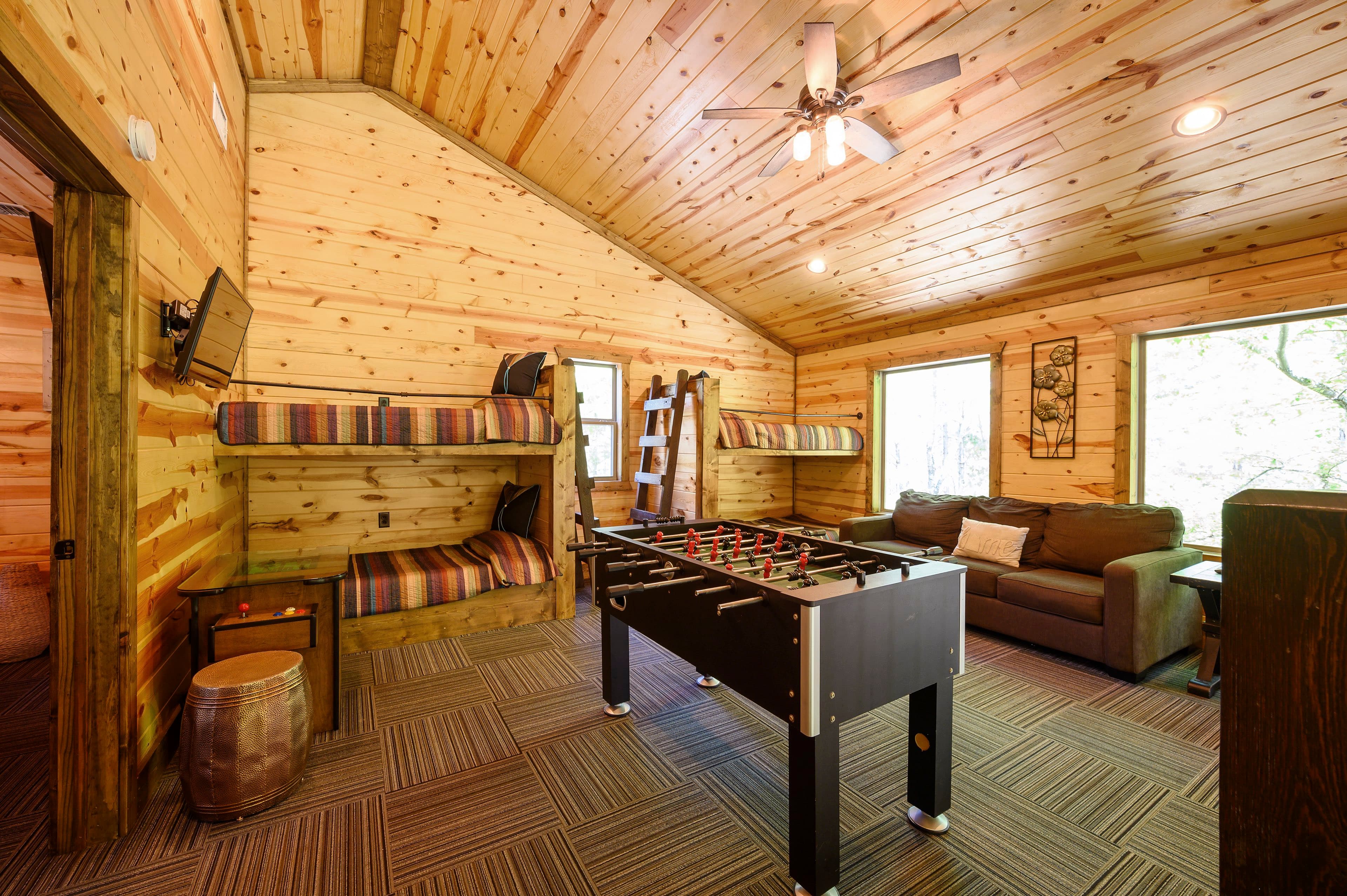 Foosball, arcade, and couch in loft