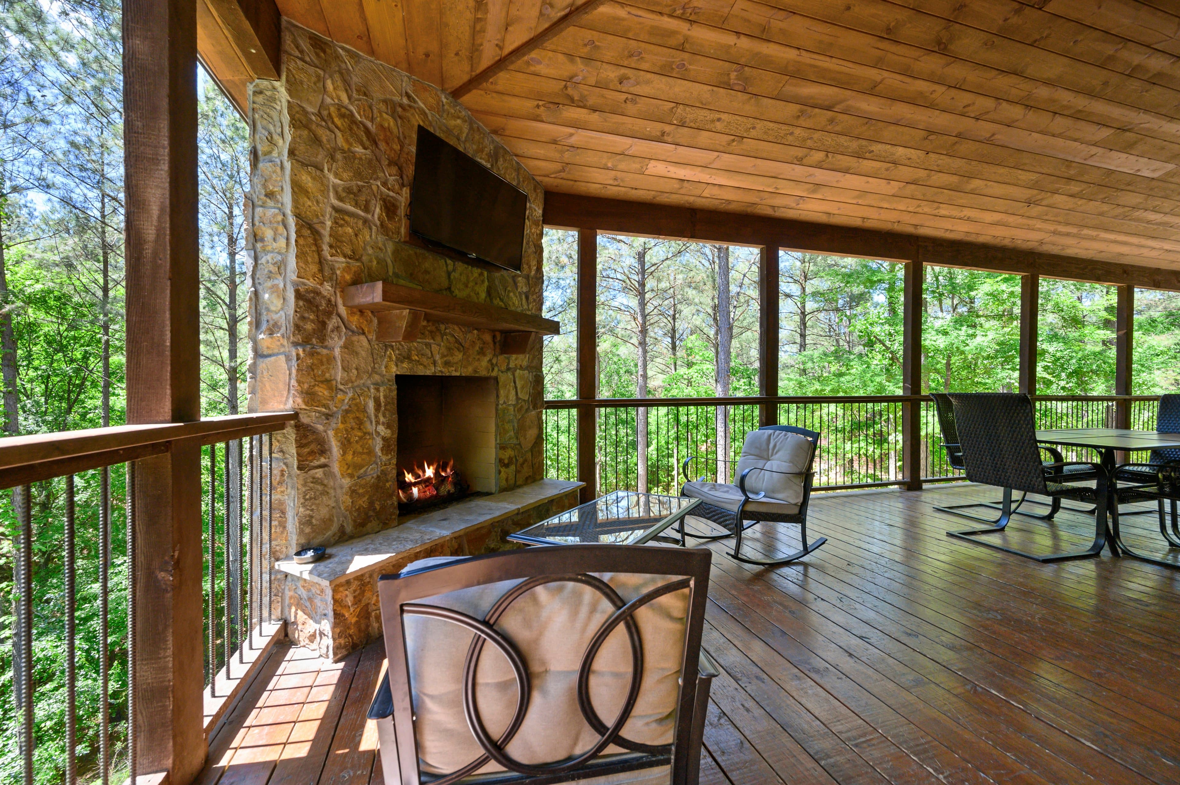 Covered back porch with fireplace