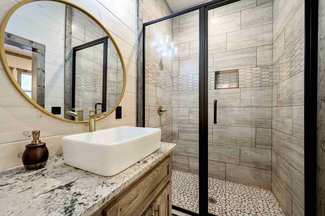 full bathroom with tile shower