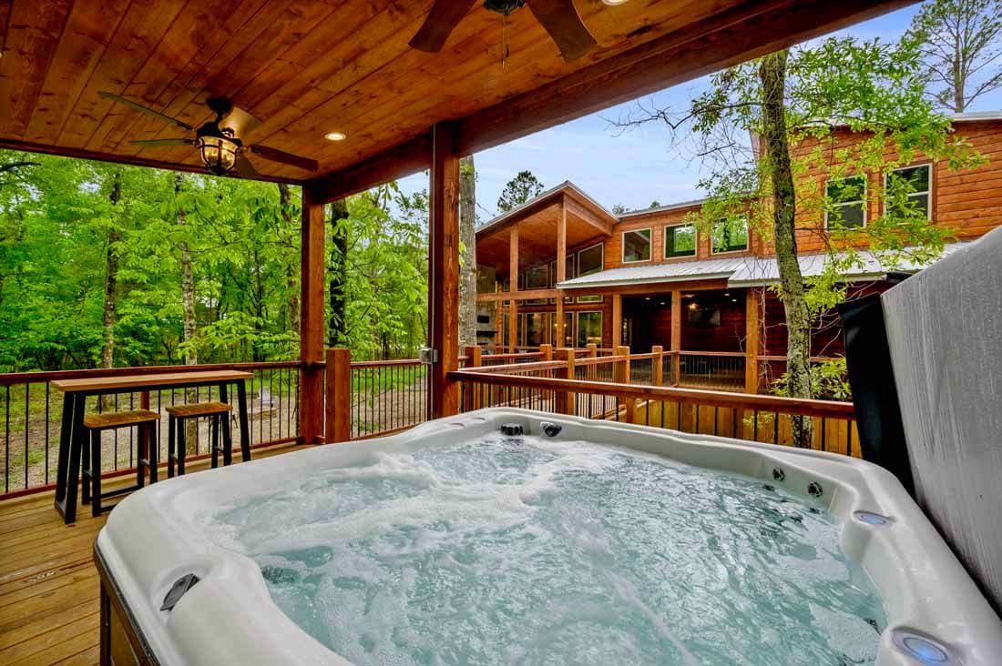 hot tub on back wooden deck and seating