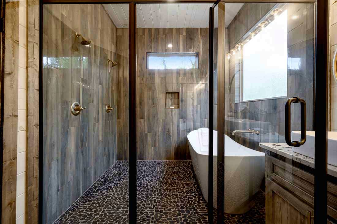 large shower with bathtub inside