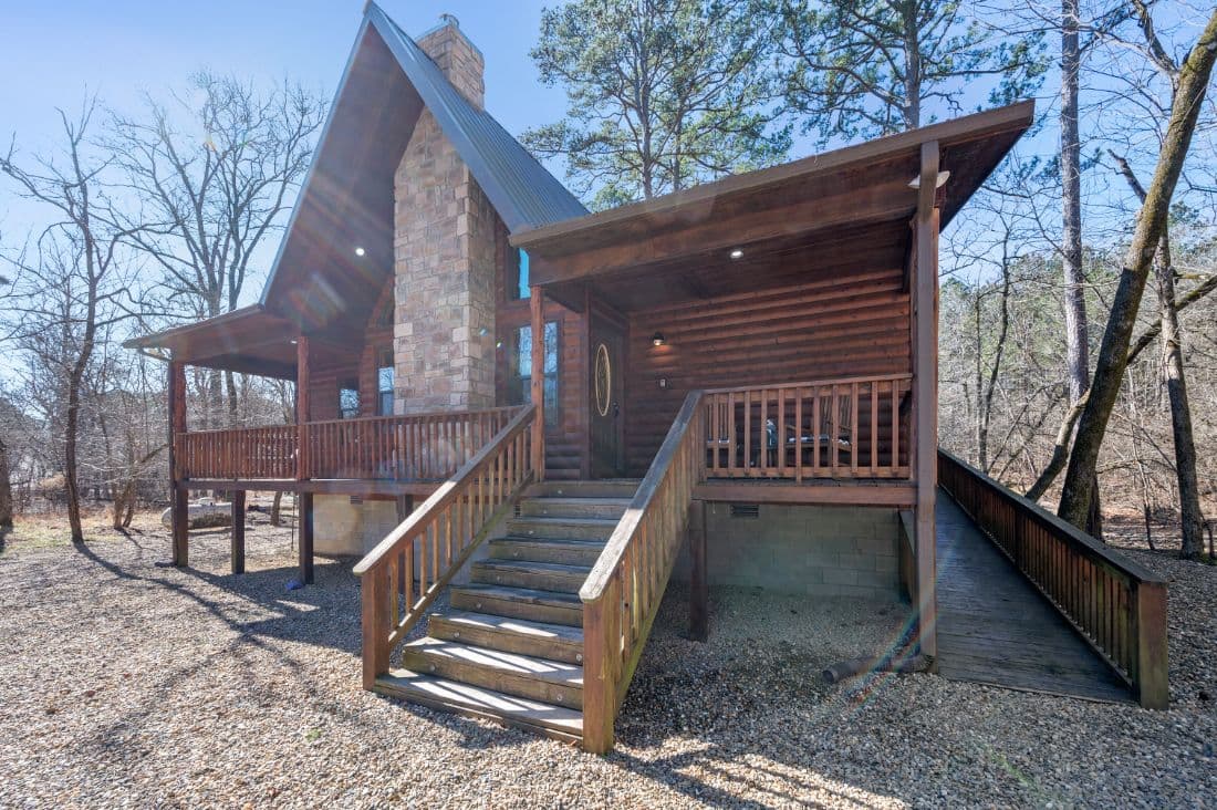 Wooden stairs in front of cabin with 9 steps