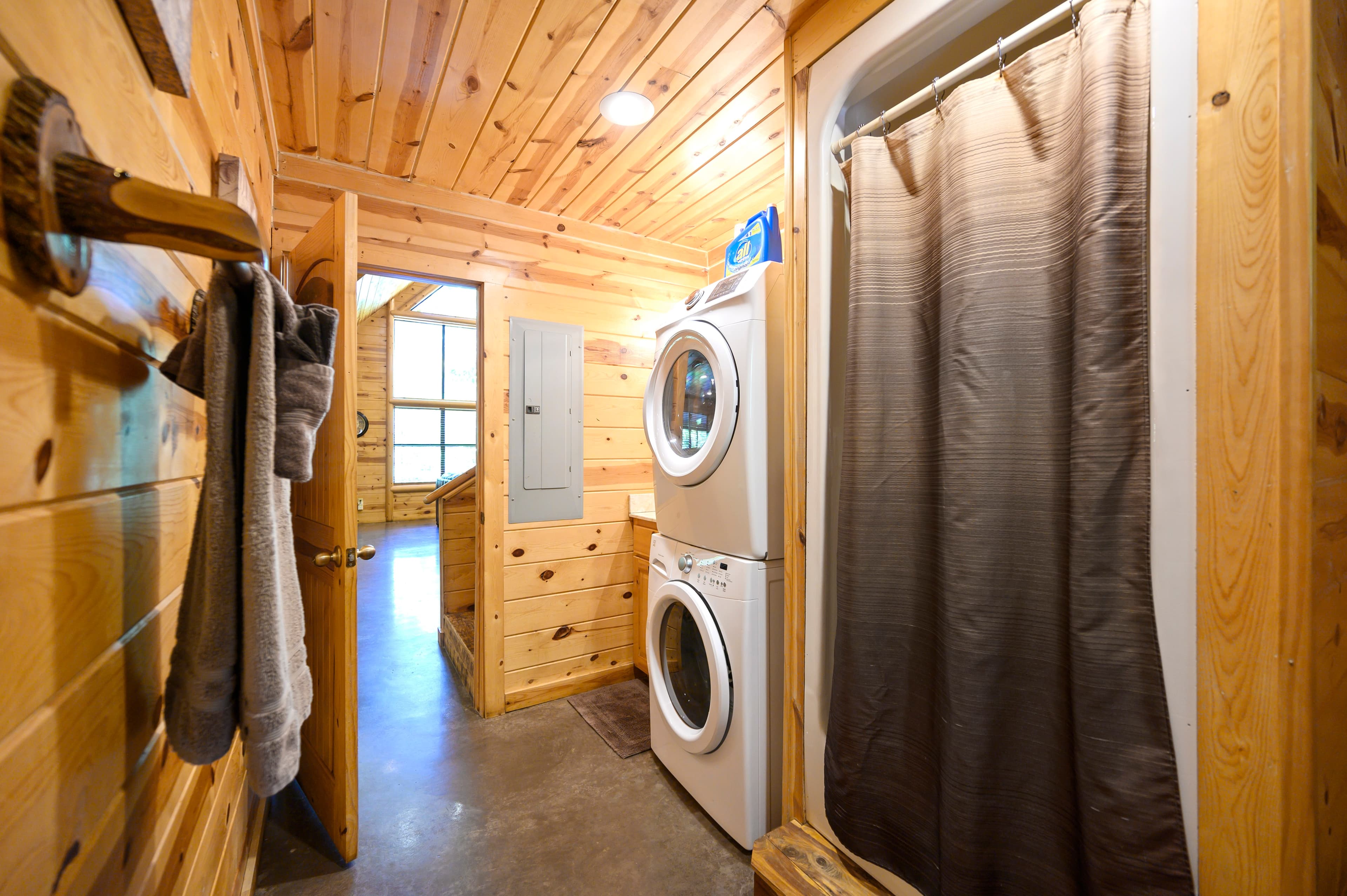 Upstairs king bedroom with 2 bunk beds and TV