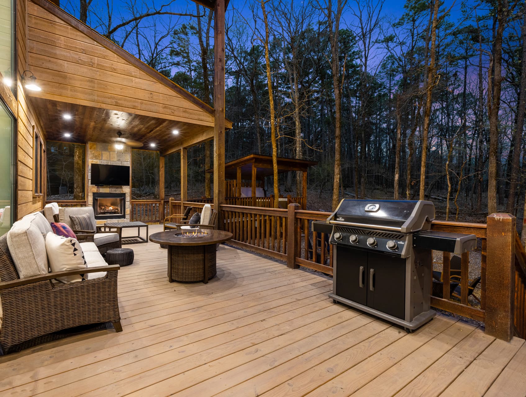 uncovered part of back porch, grill, seating, and gas fire pit