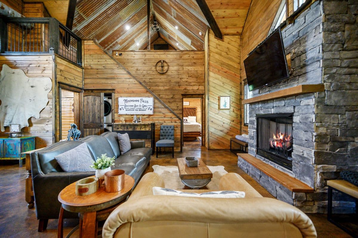 Open living room with TV and fireplace