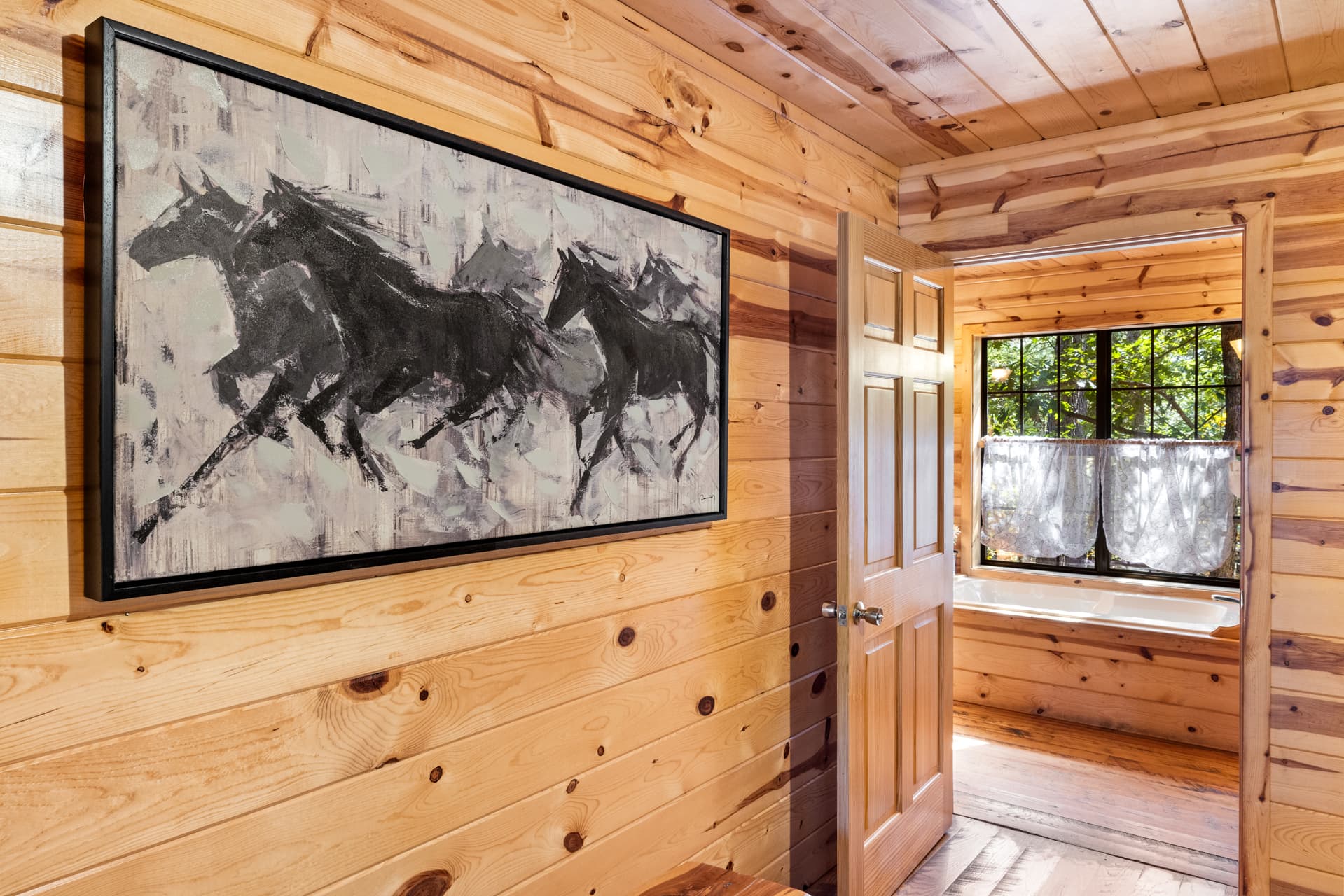 Modern horse art in 1st downstairs bedroom