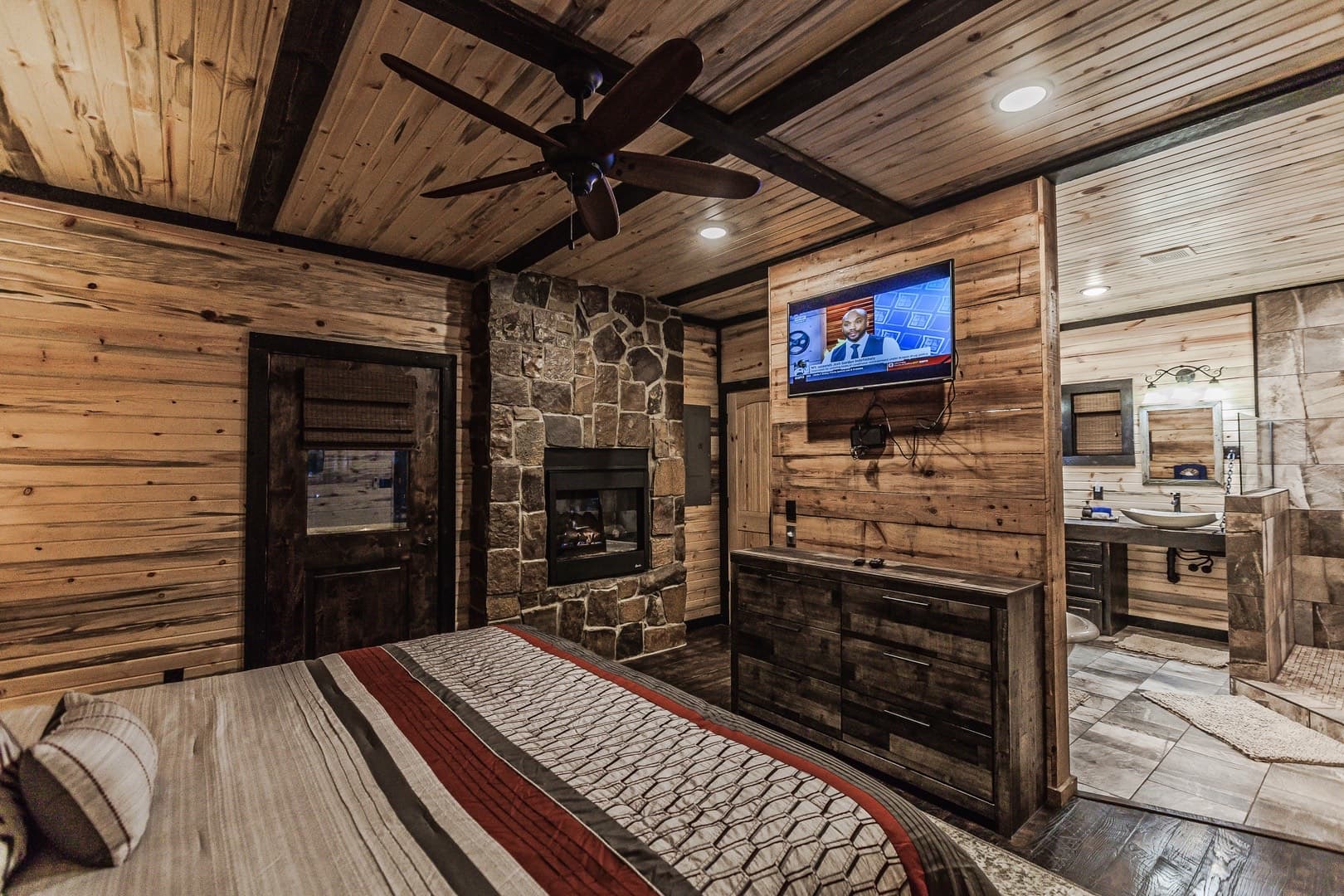 king bed, tv, and dresser