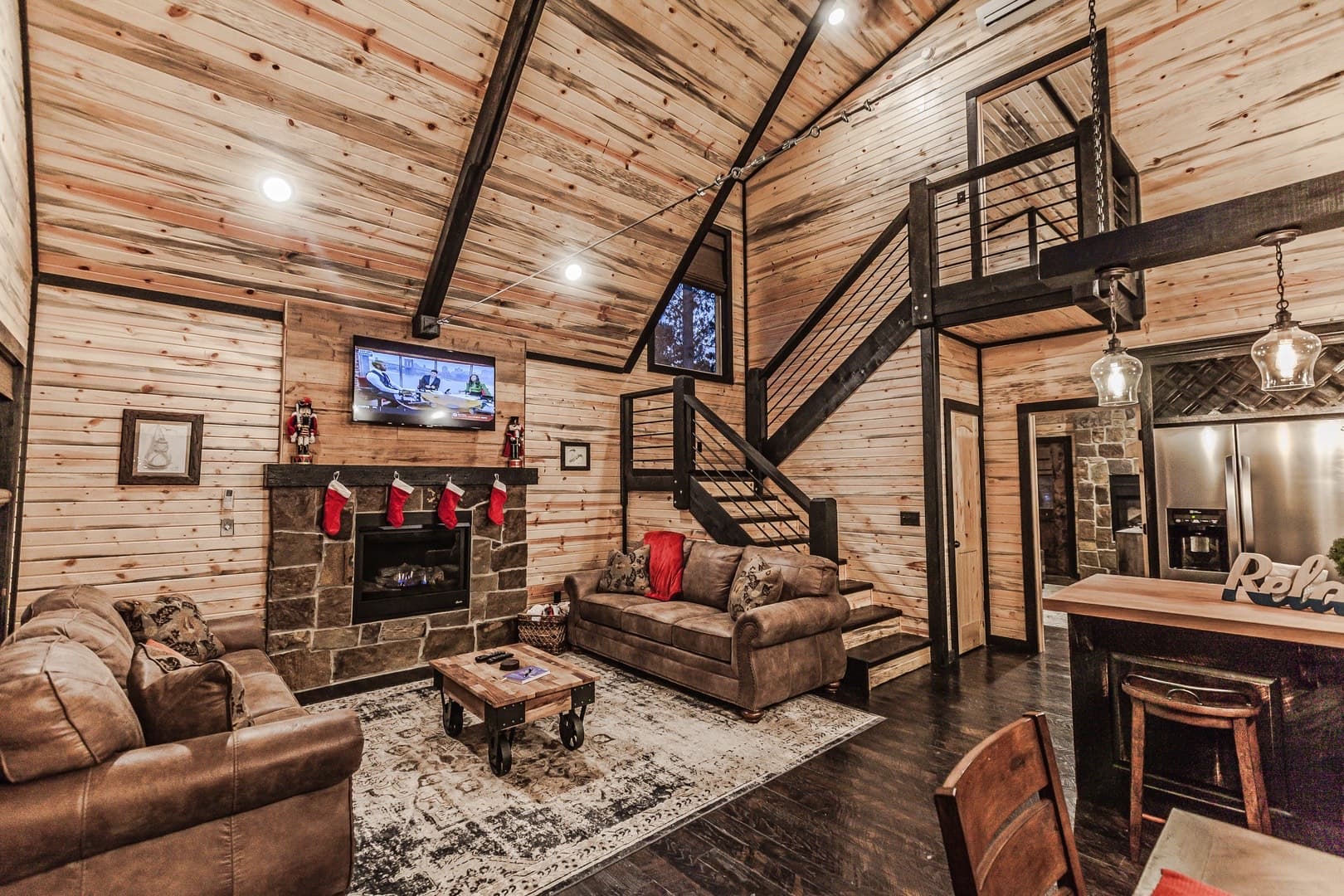 open living room with tv and 2 couches