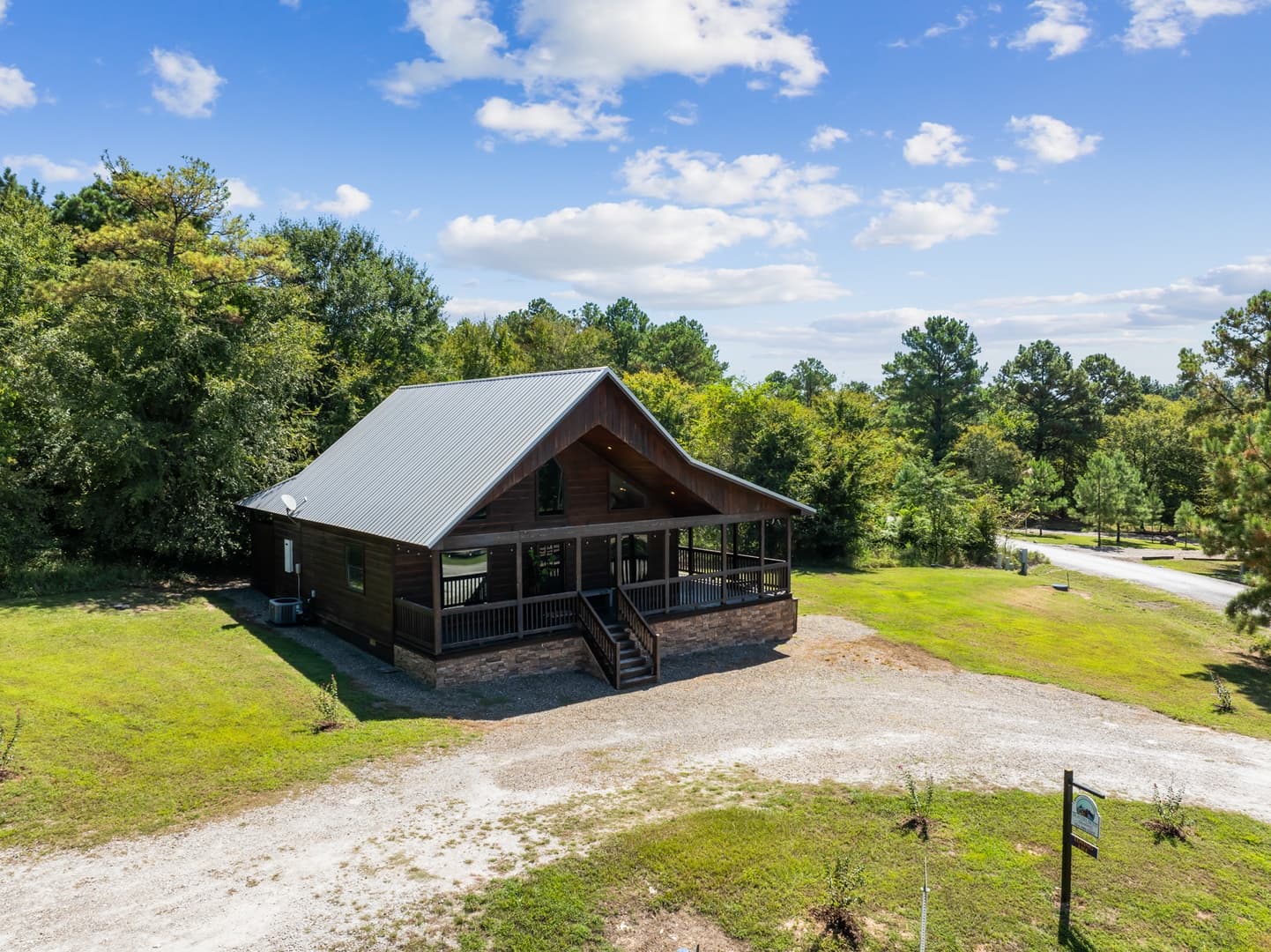 log cabin with circle drive