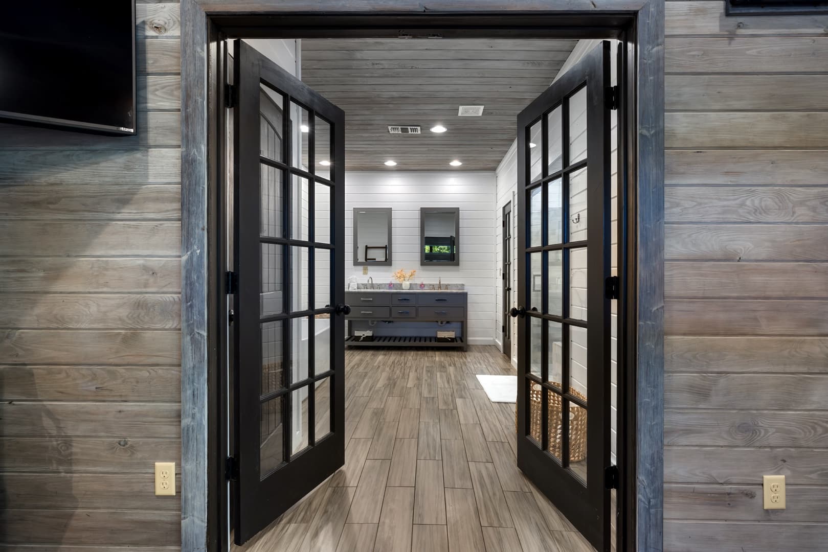 doors to large bathroom