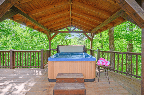 Cozy wooden cabin interior with a bar area and tiled countertop.