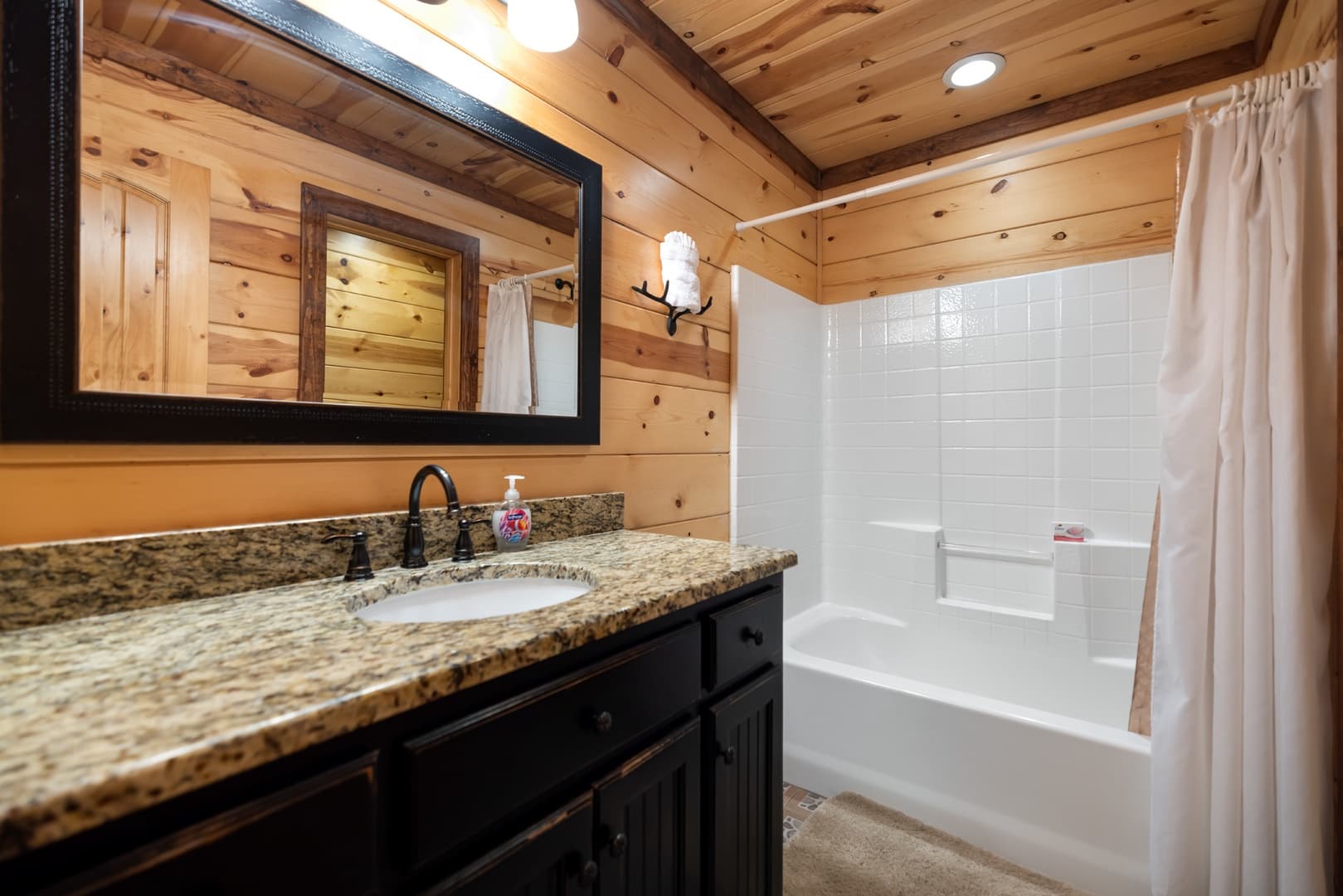 Bathroom shower and sink with plenty of counter space