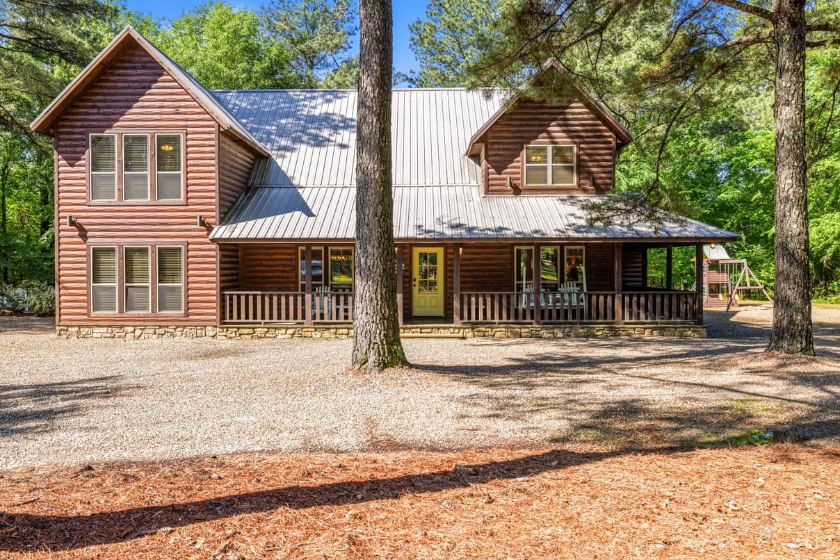 Front of two story log cabin