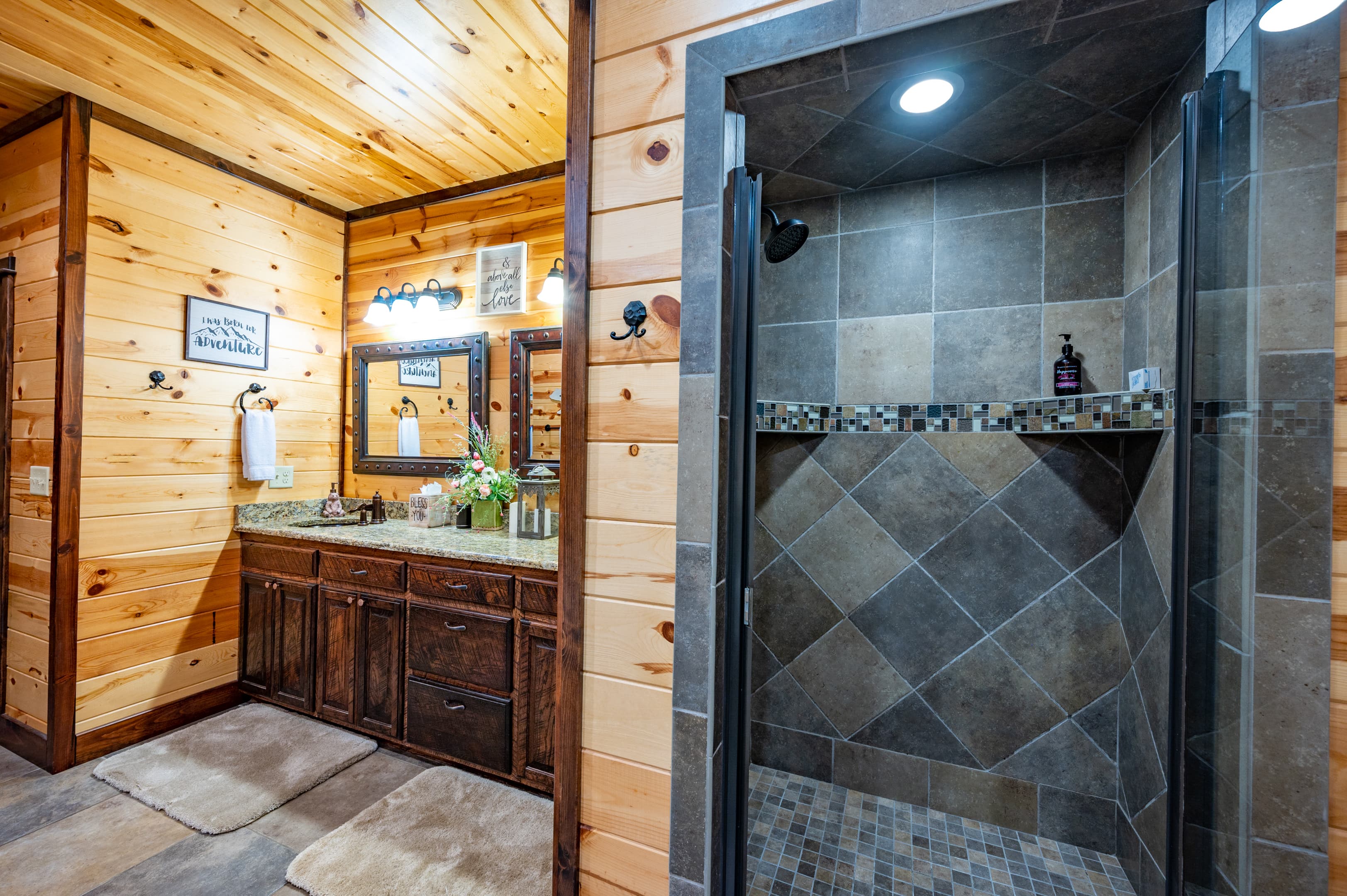 walk in tile shower and sinks