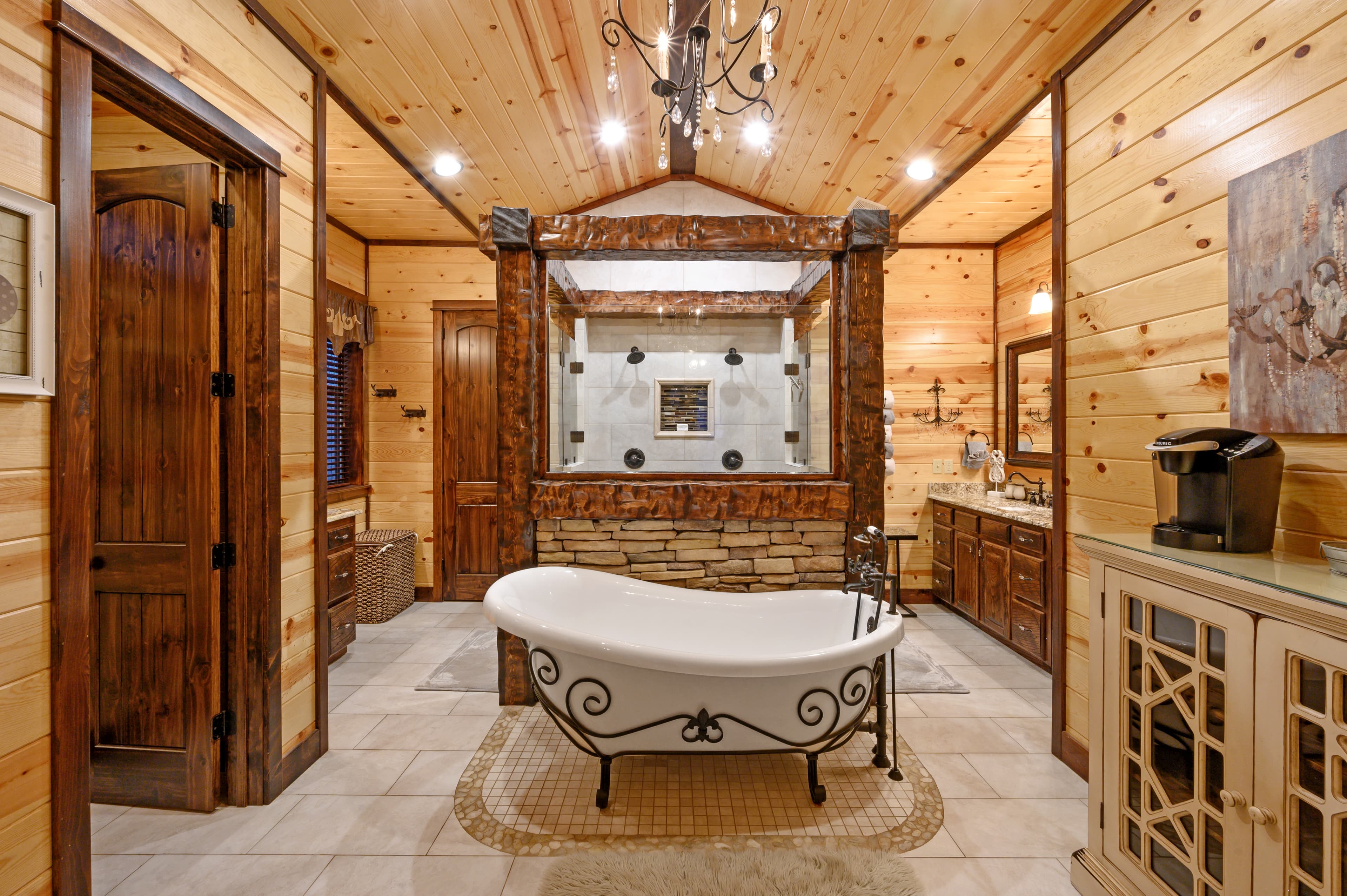 modern bathroom, shower has 2 heads, and a bath tub next to shower