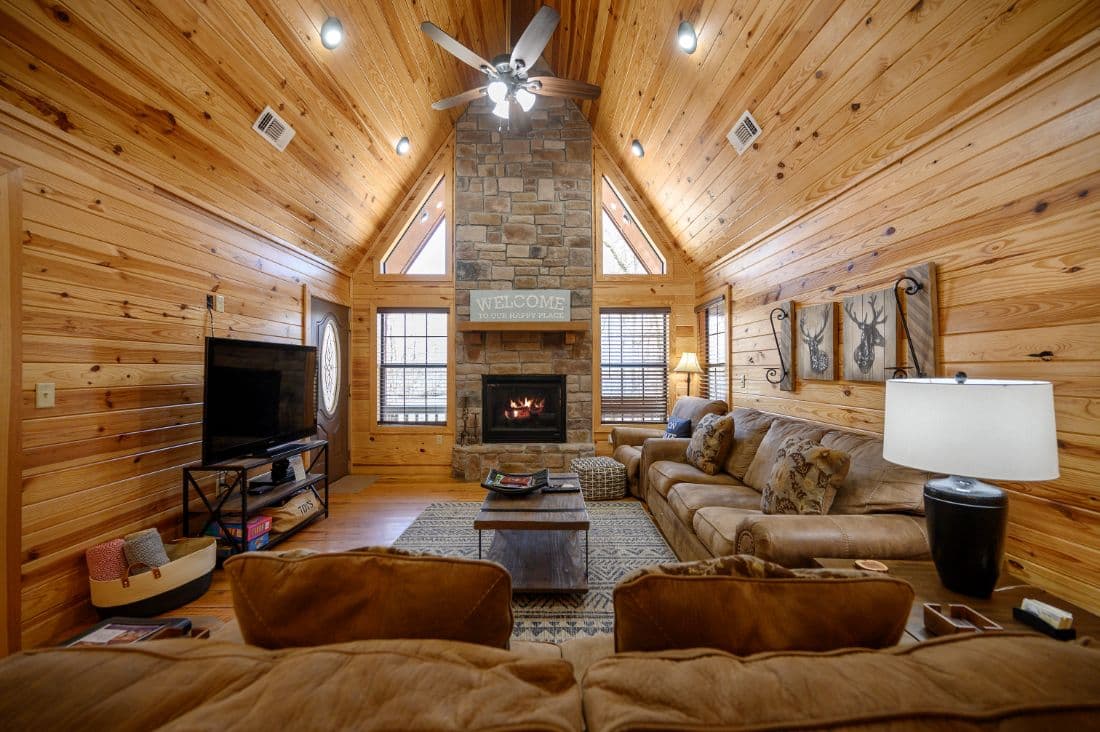 Living area 2 couches and rock gas log fireplace