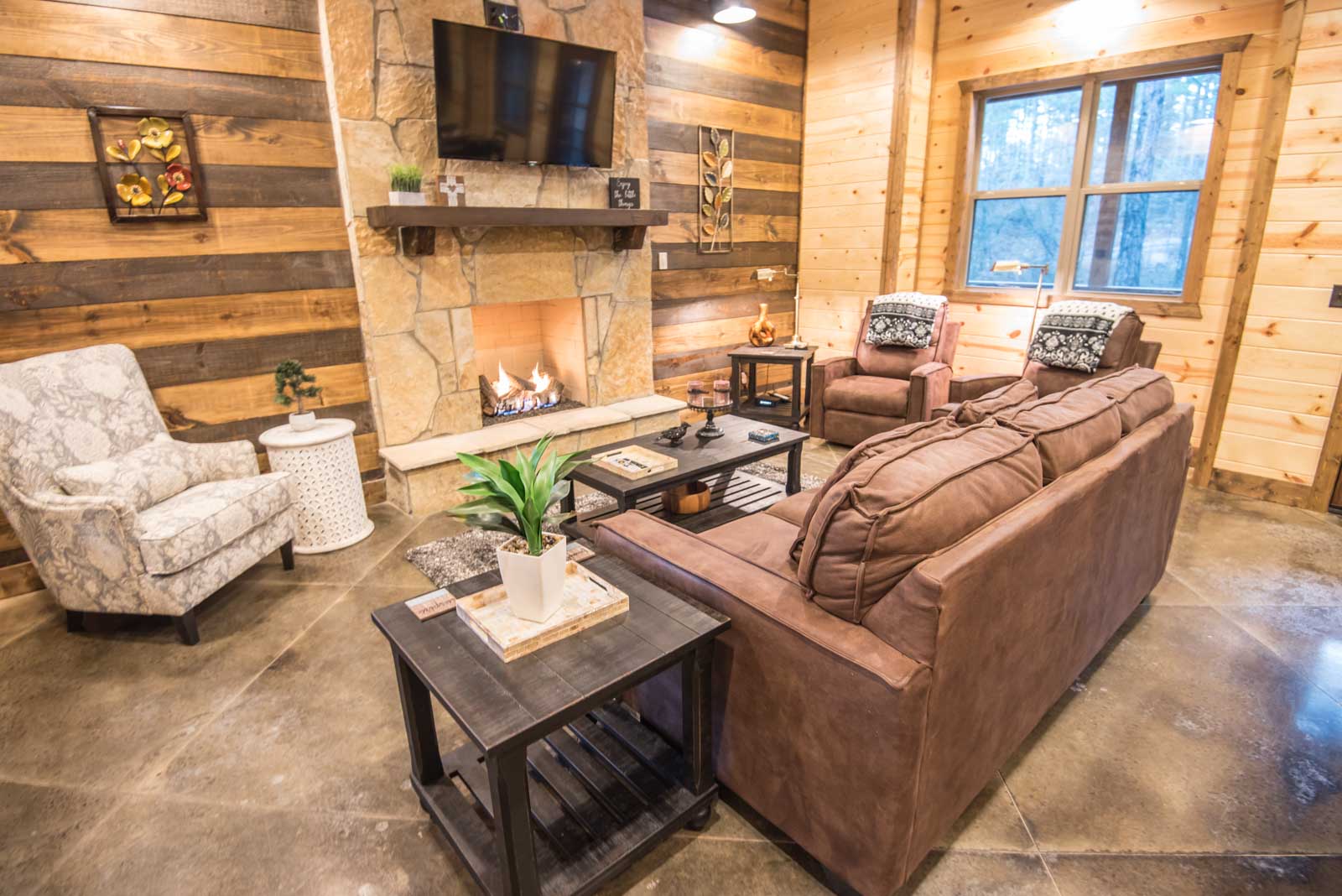 Outside covered porch fireplace with seating