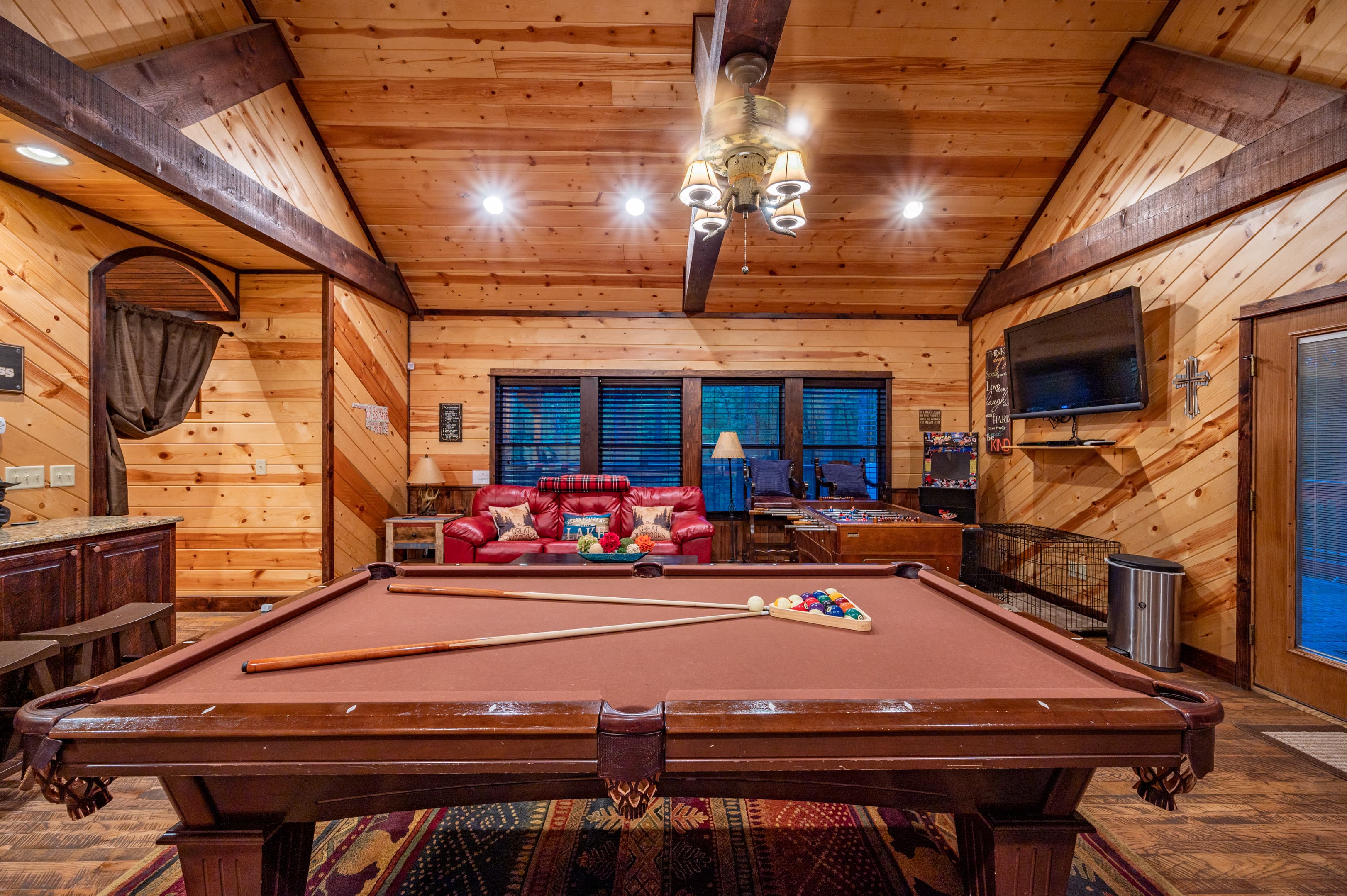 pool table and tv in game room