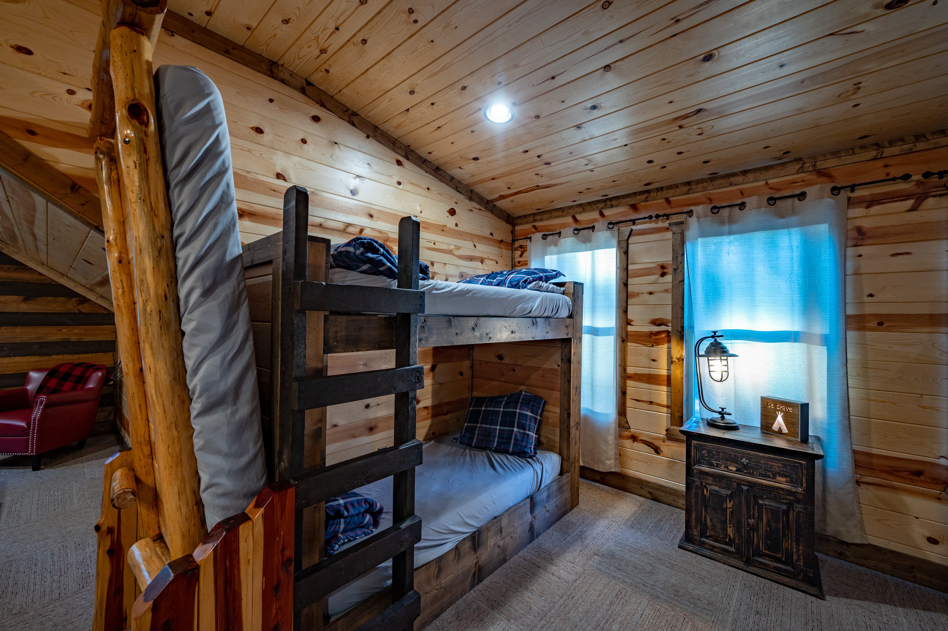 Bunk beds plus a fold out bed, Side table, lamp
