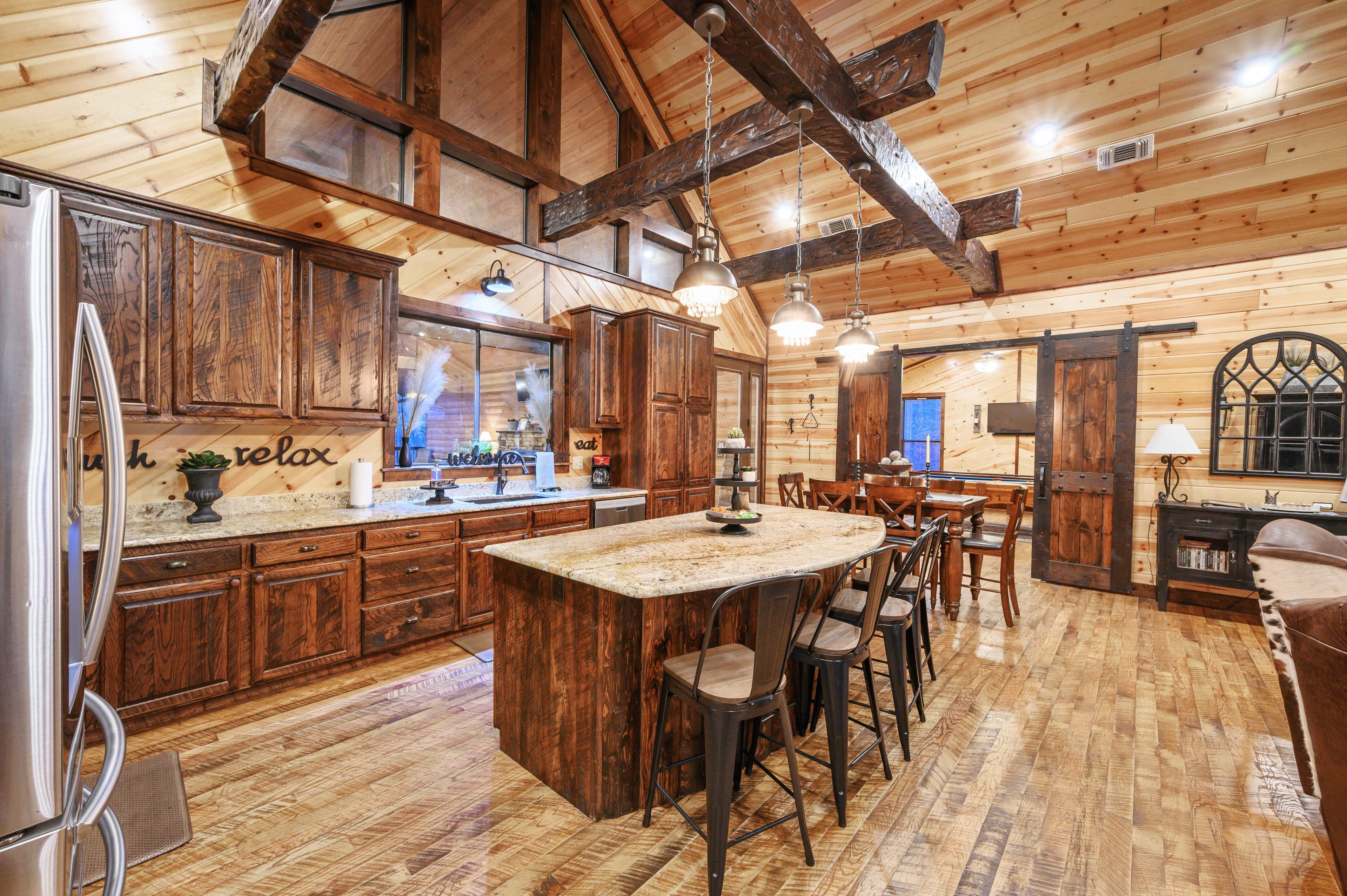open full kitchen with island and seating