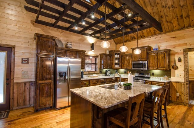 A kitchen inside a Broken Bow cabin rental guests can cook in if they don't feel like going to restaurants.